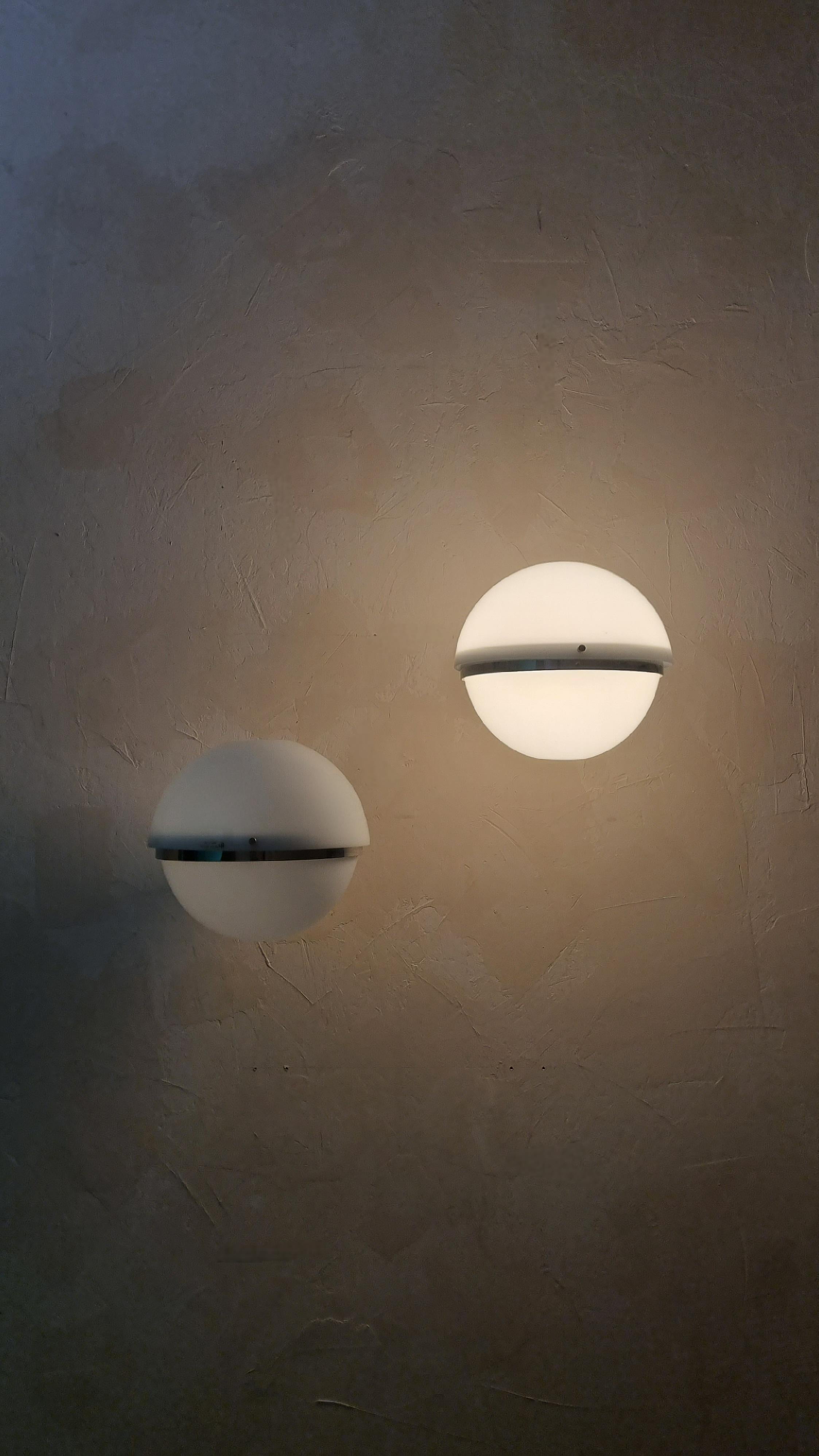 Space Age Wall sconces by  Harvey Guzzini for Guzzini, 1969 Italy For Sale