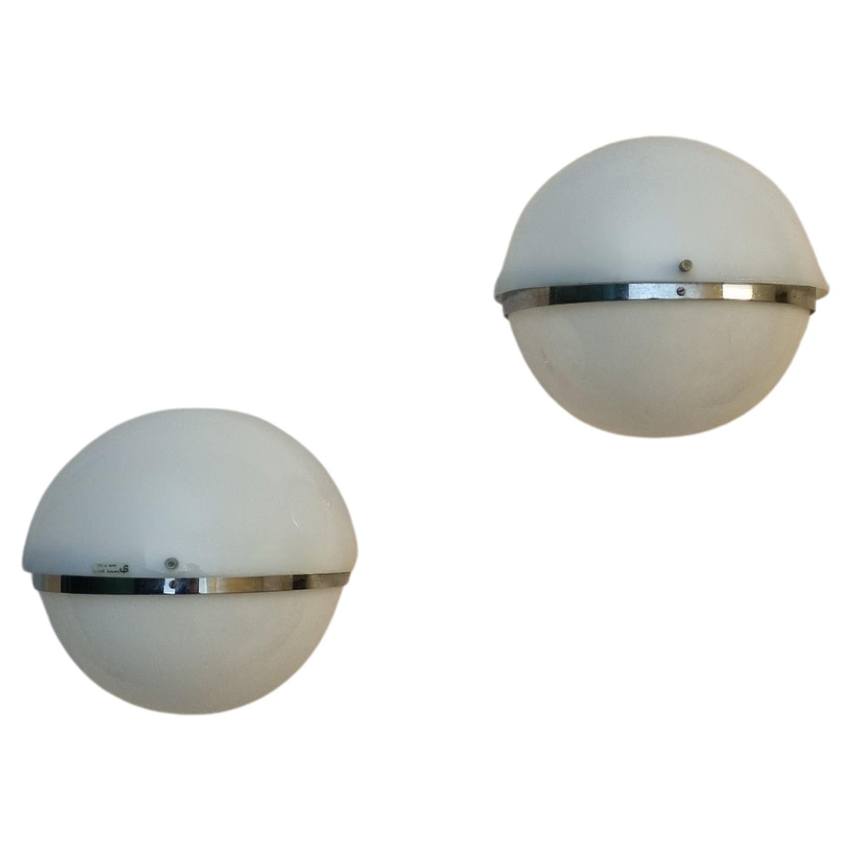 Wall sconces by  Harvey Guzzini for Guzzini, 1969 Italy For Sale