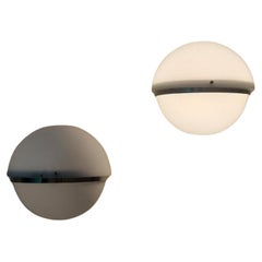 Wall sconces by  Harvey Guzzini for Guzzini, 1969 Italy