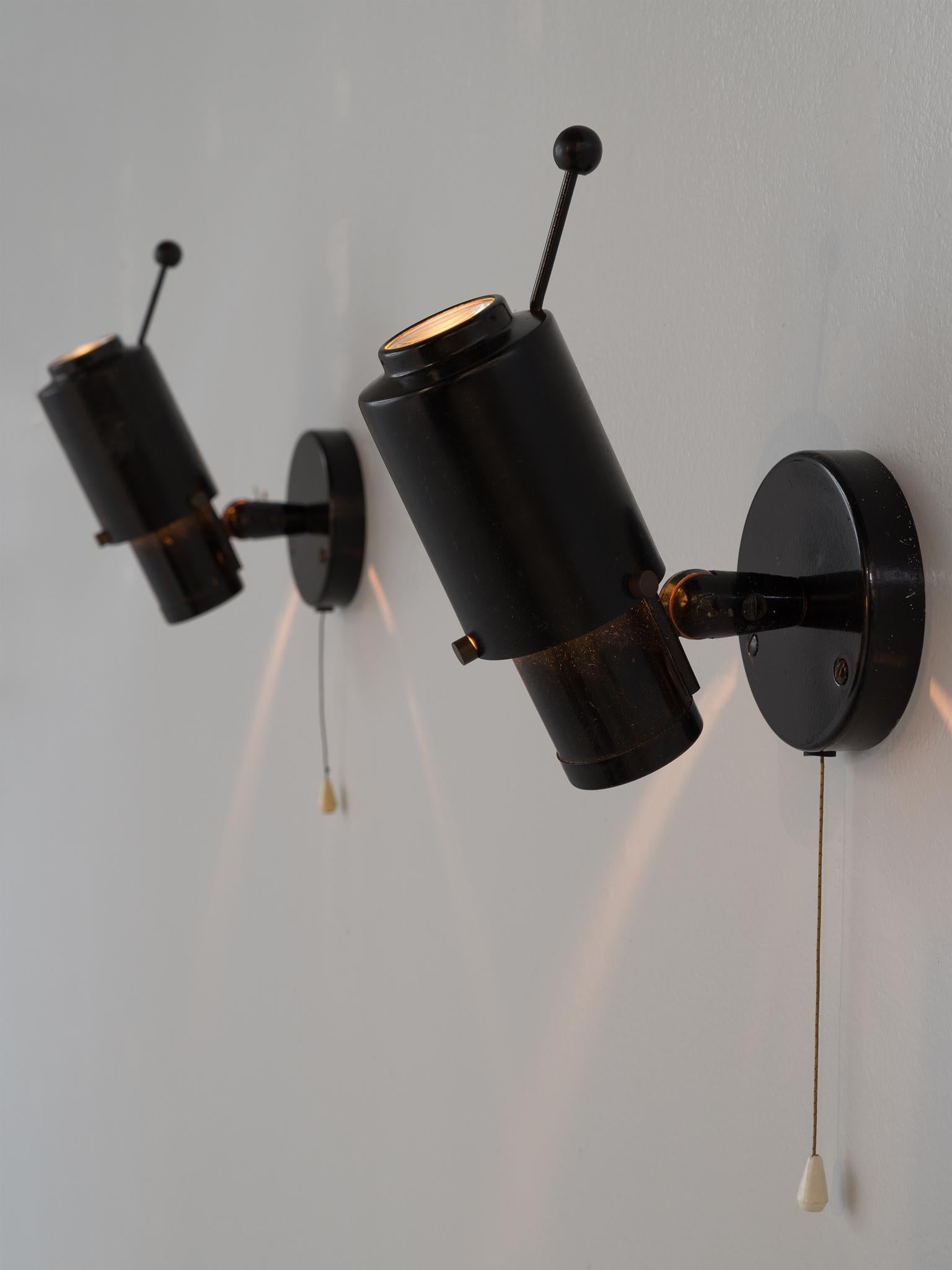 Jacques Biny for Lita, wall lights in steel, France, 1950s. 

These wall sconces are titled 'Zodiac' and designed in the 1950s by Jacques Biny (1913-1976). Although Biny's name does not ring a bell for everyone, he is one of the most important