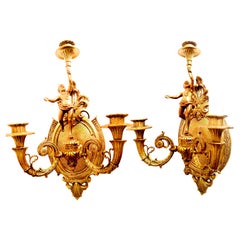 Antique  Wall Sconces French Empire Style Whit Cherub Putti Carrying Torch, Bronze, Pair