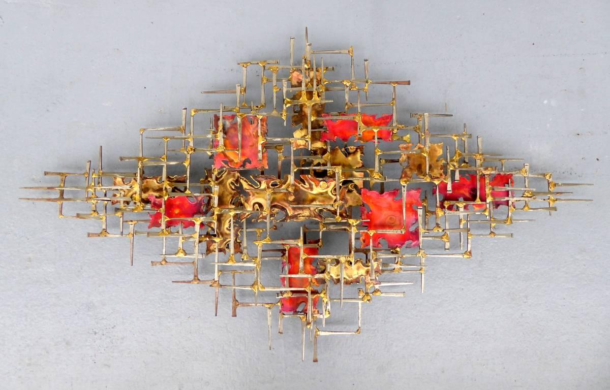 An exceptional wall sculpture by William and Bruce Friedle made of masonry nails and polychrome torch-cut patinated brass.

A few important notes about all items available through this 1stdibs dealer:

1. We list all our items as being in 