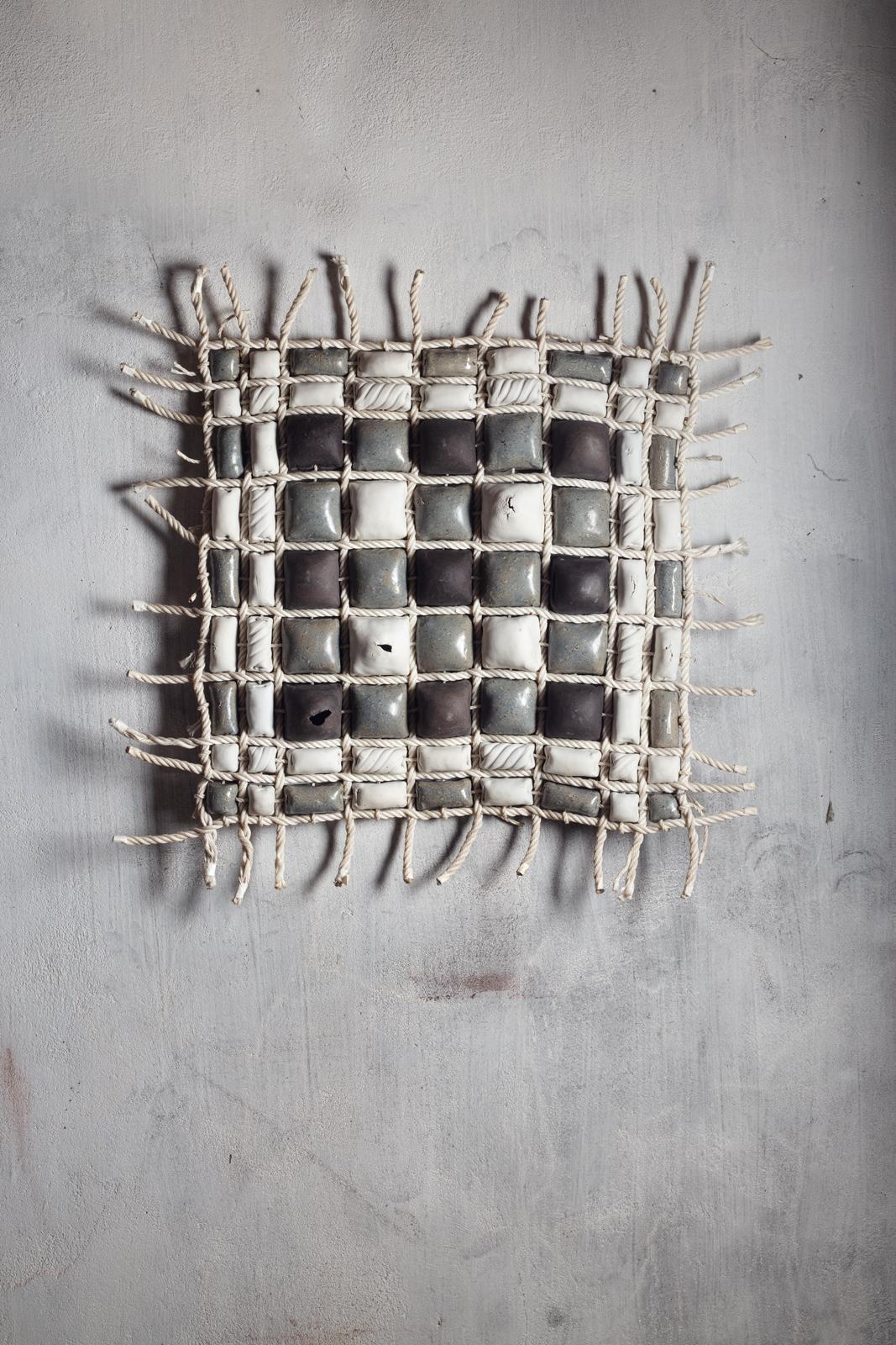 Wall sculpture entitled « Tressage » in porcelain, stoneware and rope by Anne Barrès. 
circa 1980-1990. 
Unique piece.
H : 31.5’ x 31.9’ x 3.9’ inches.
Approximate dimensions.