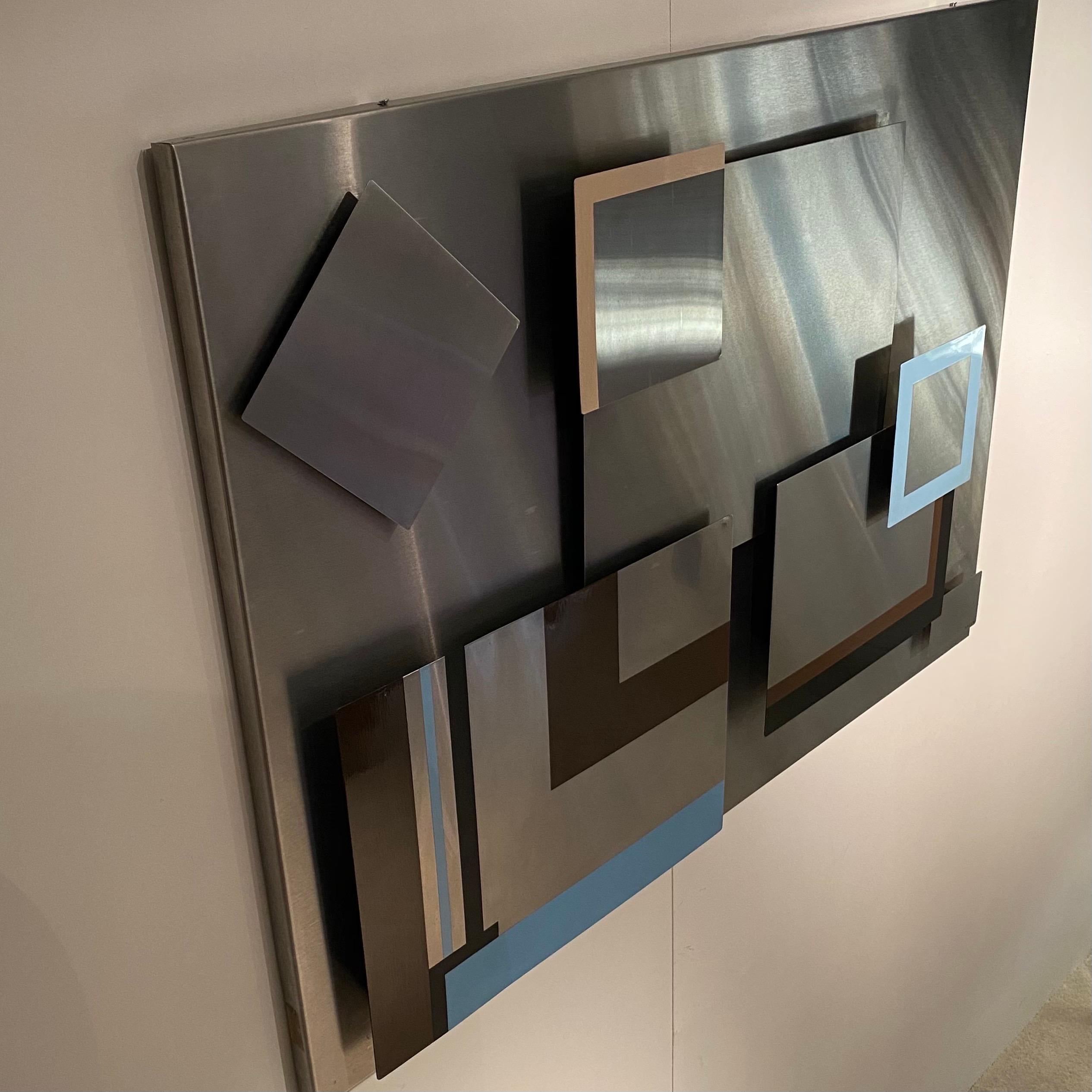 Magnetic panels in stainless steel whose Various elements are fixed by magnets.Geometric compositions in stainless steel and lacquered colors gives an abstract pictorial art.
Signed Orvan,1972.
In october 1970,the artist Orvan exhibited his works