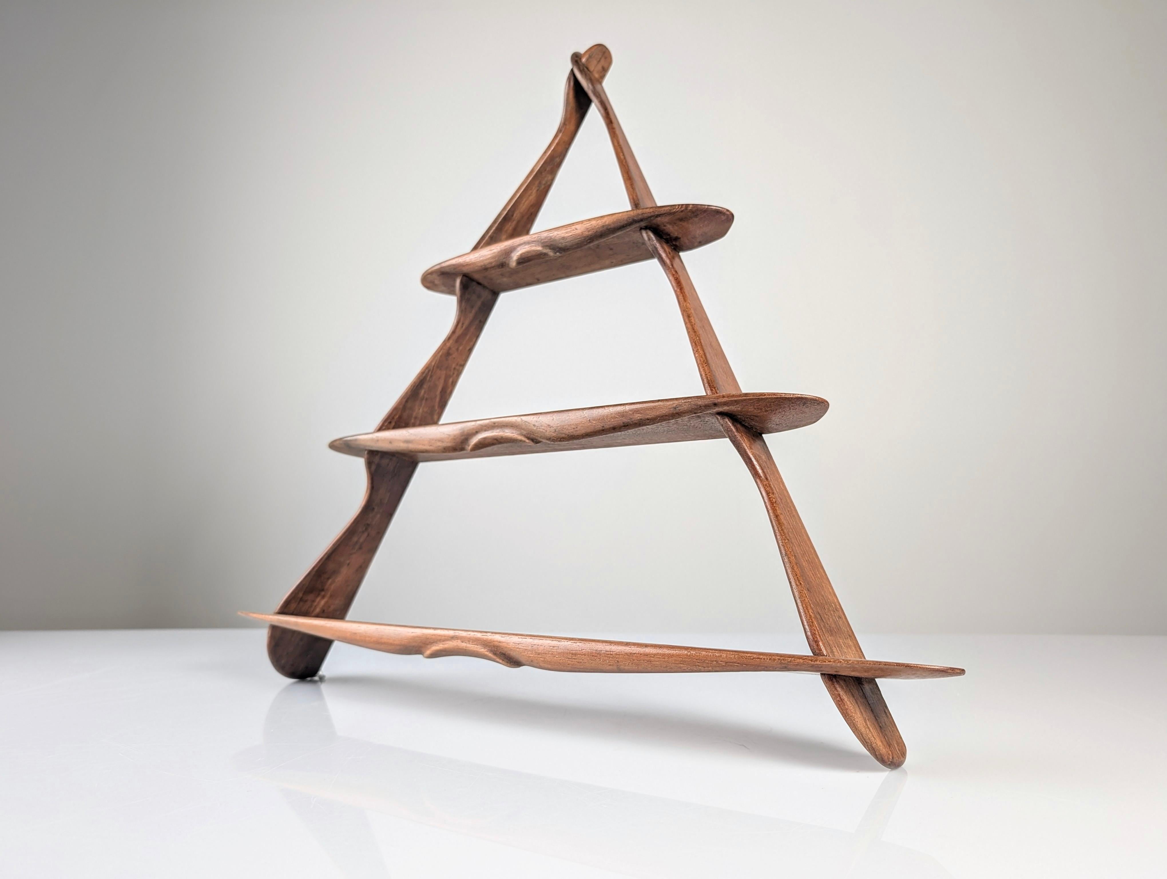 Solid wood wall shelf, attributed to Peder Moos and made in Denmark around 1950. This piece is strongly linked to the workshop of the celebrated Danish cabinetmaker through Anne Bony’s publication, which features a two-tier shelf with a closely