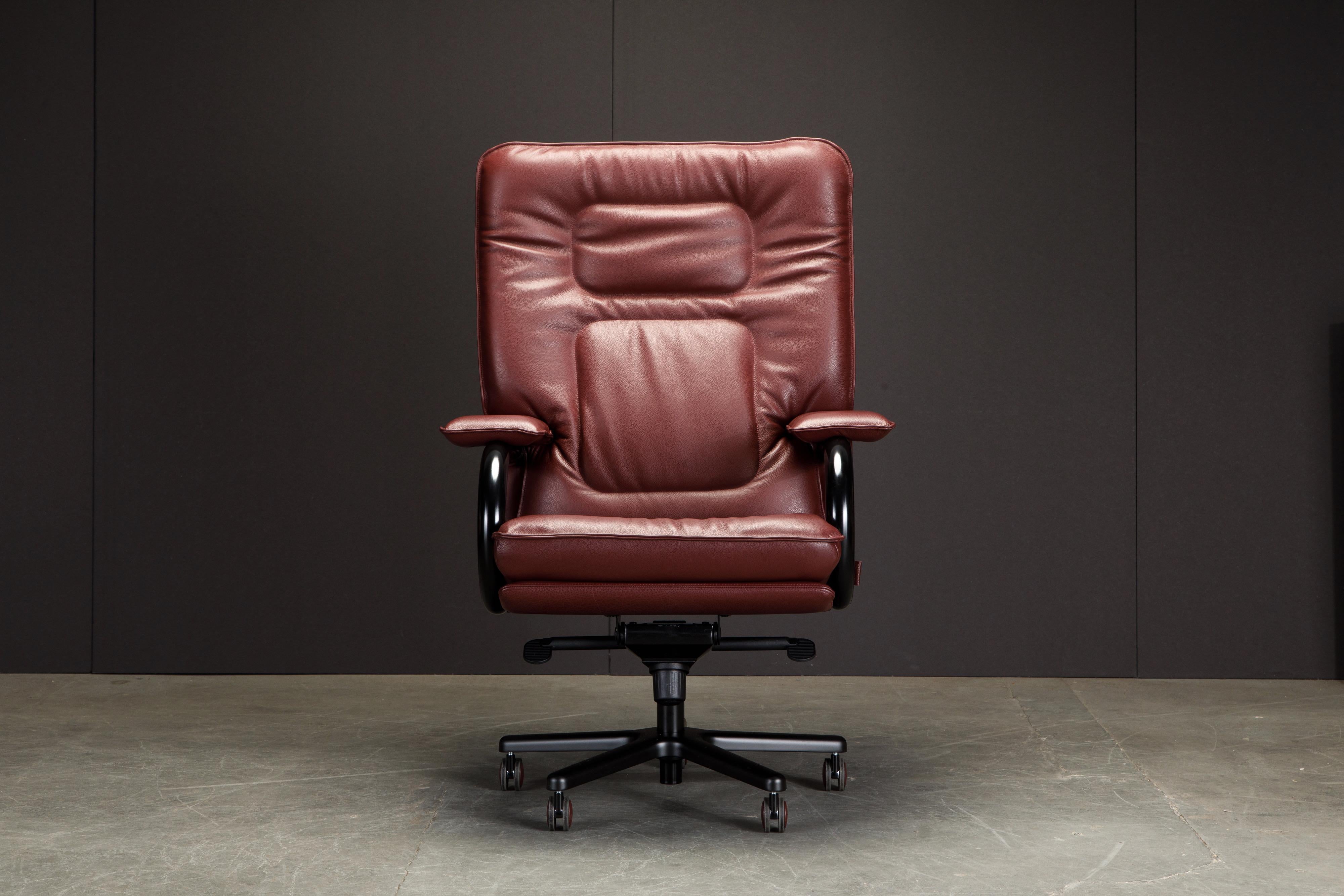 This incredible executives chair is named 'Big', designed by Guido Faleschini by i4 Mariani originally designed in the 1970s, this example newly produced in a gorgeous burgundy leather with lacquered black frame, the same color combo as featured in