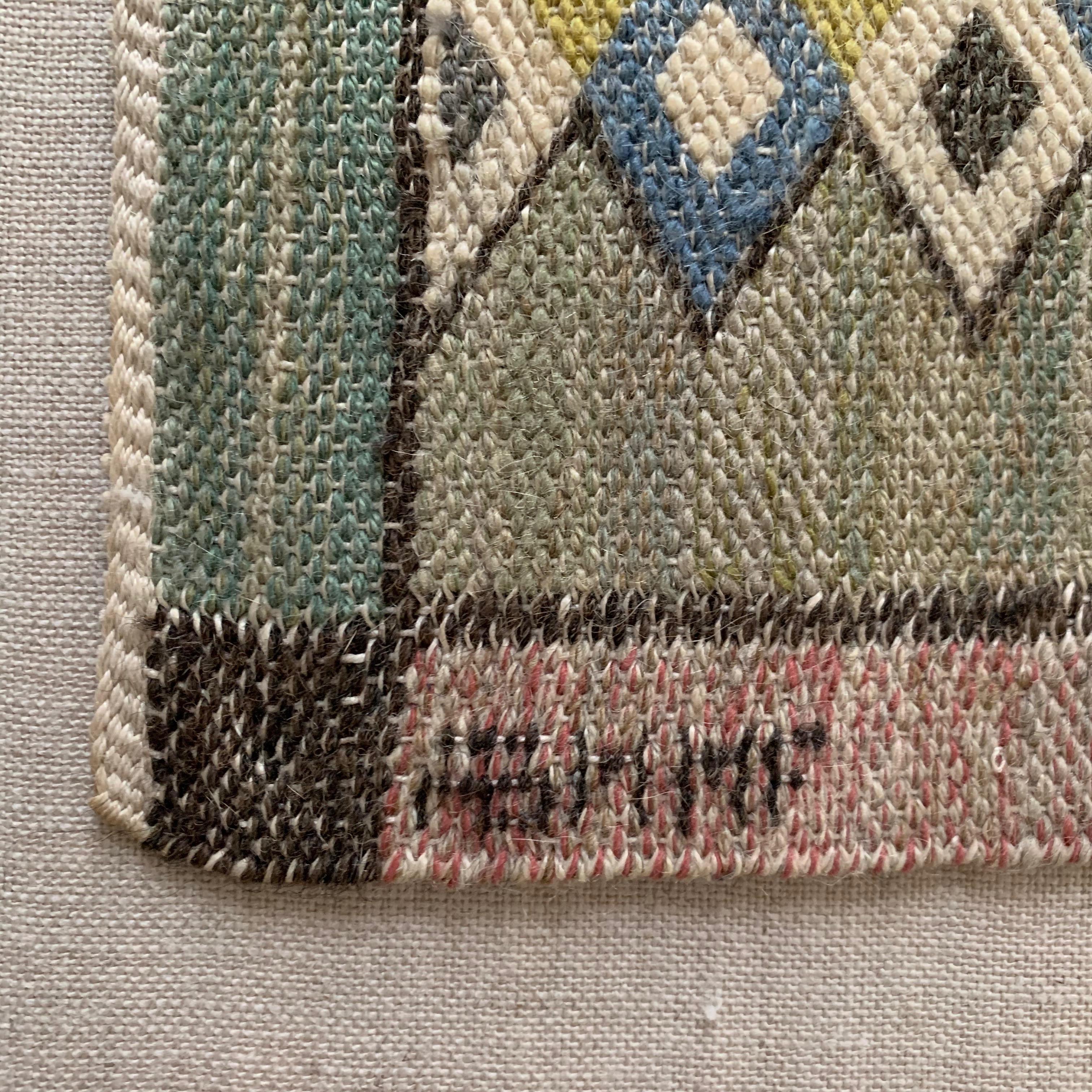 Handwoven wool tapestry mounted on linen

Designed by Barbro Nilsson for Mårta Måå-Fjetterström in 1925 and produced after 1941 

Signed by AB MMF

Designed and made in Båstad, Sweden.