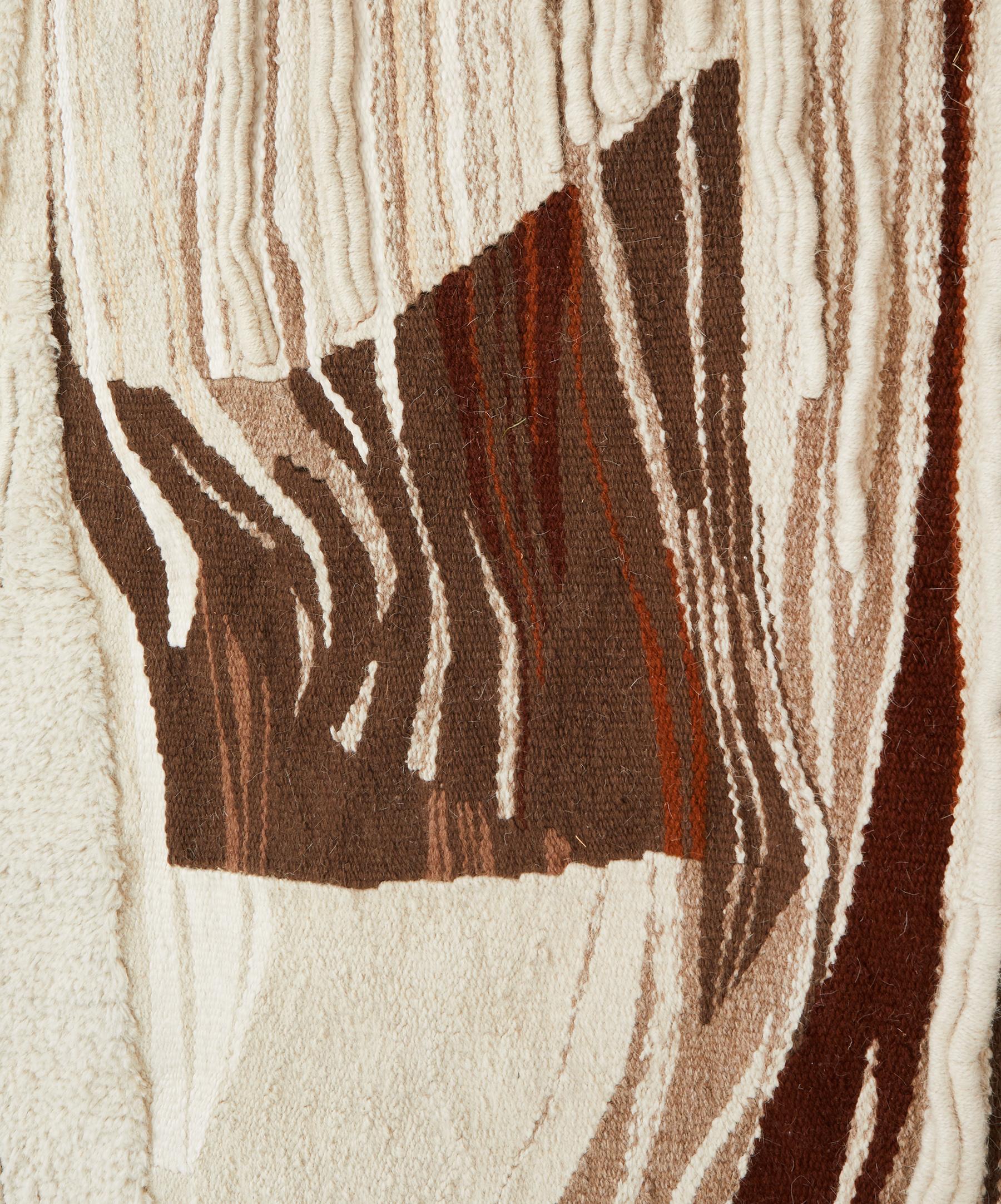 Wall tapestry by Swiss artist Claire Wermeille who studied tapestry in Aubusson as well as in Poland around 1960.

Wool with colors of ivory, beige, brown, black and red.

This work reminds the works of polish textile artists such as Maria