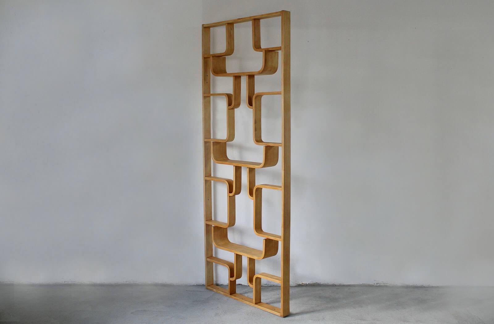 Midcentury Wall Unit in bent plywood designed by Ludvik Volak, produced by Drevopodnik Holesov in1960s. A memorable design of Mr. Volak, yet still very fresh and modern piece. This object can be used as a shelving unit or room divider, flowers