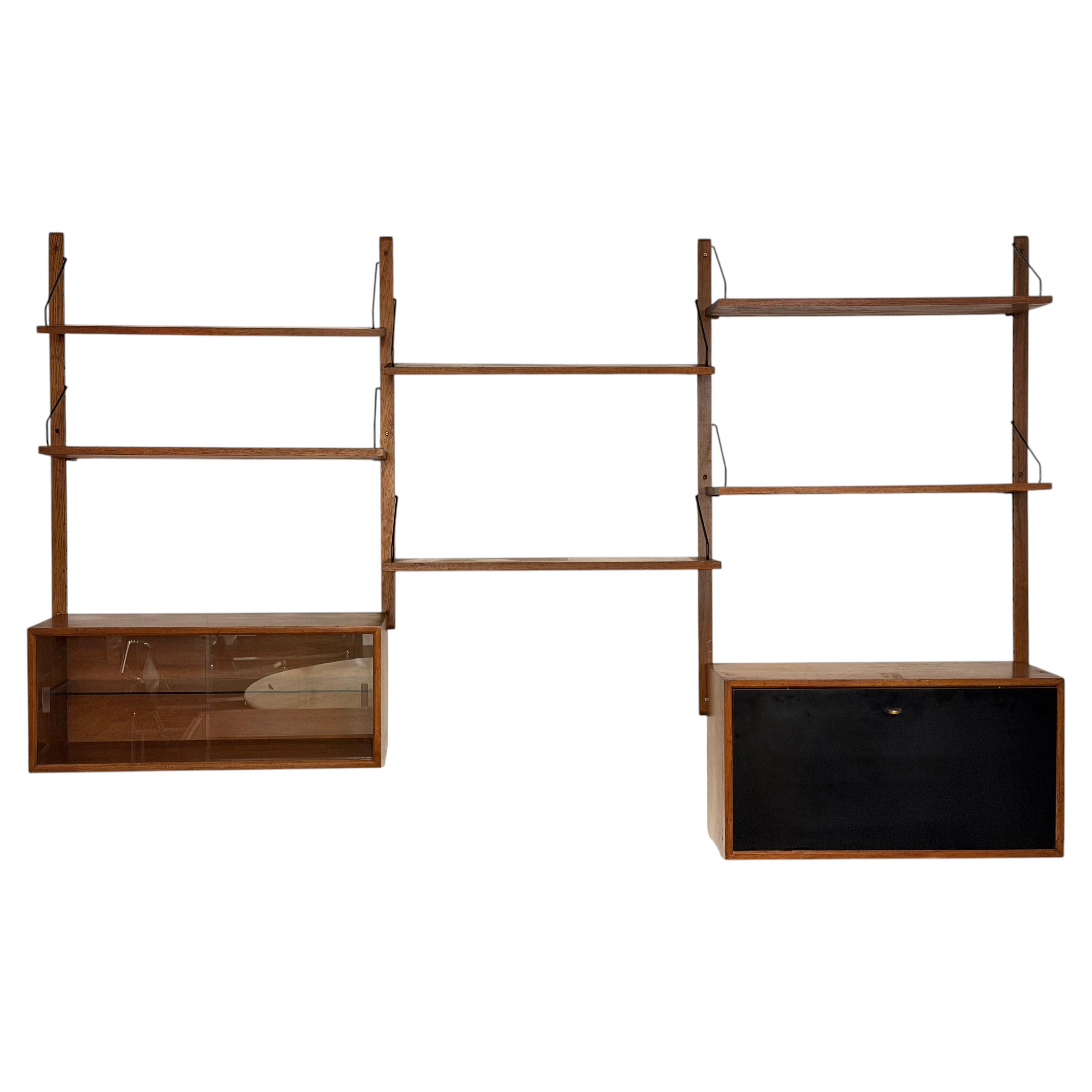 Wall unit in teak in the style of Poul Cadovius - 1960s For Sale