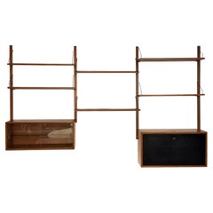 Wall unit in teak in the style of Poul Cadovius - 1960s