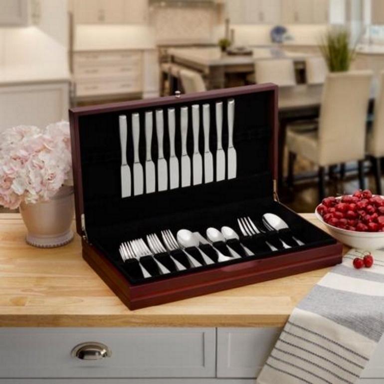 Use this wallace dark walnut flatware chest to safely store your precious flatware. Beautifully crafted of wood with a dark walnut and a brush silver knob, this lovely chest has slots to keep like utensils separate and organized, with individual