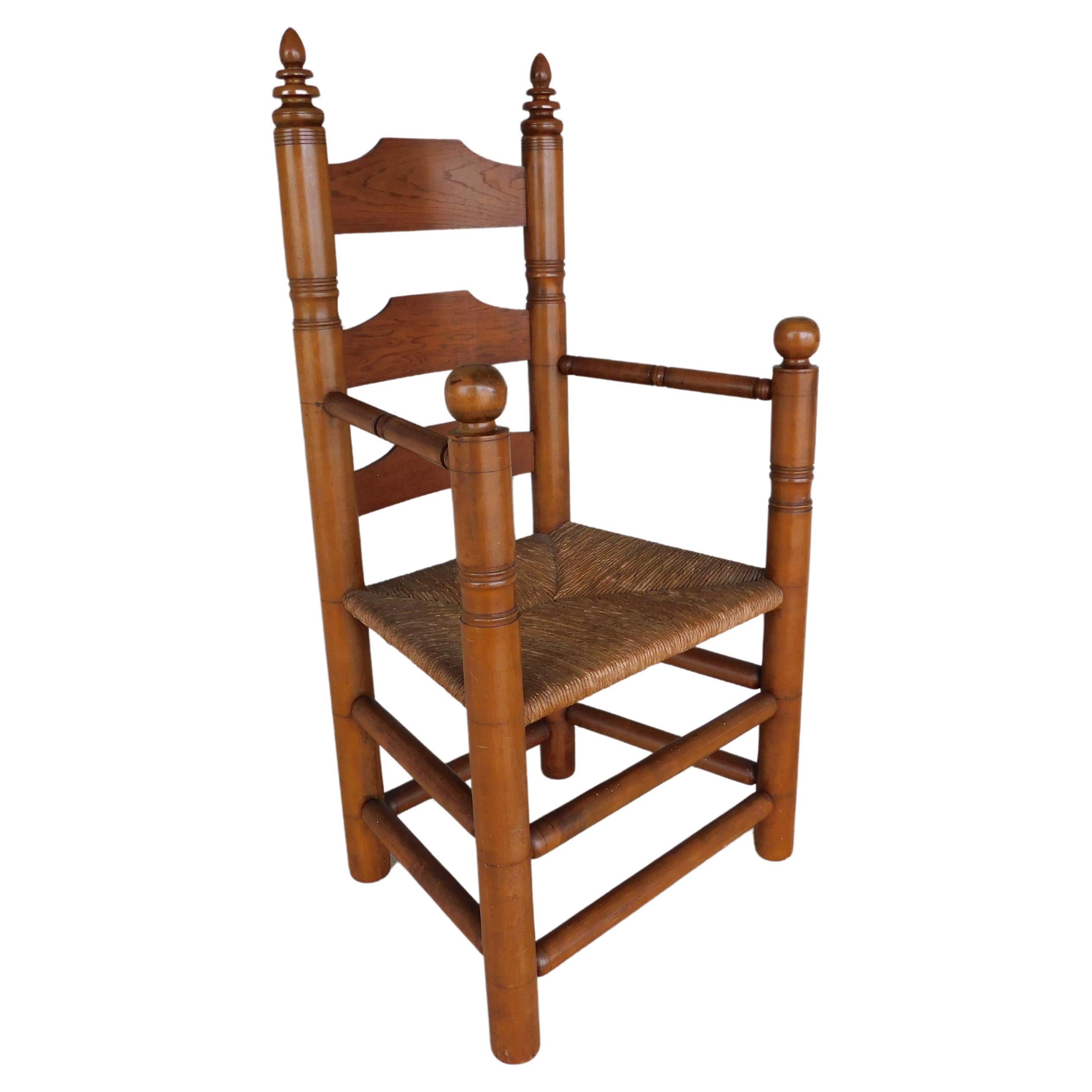 Wallace Nutting #393 Pilgrim Ladder Back Arm Chair For Sale
