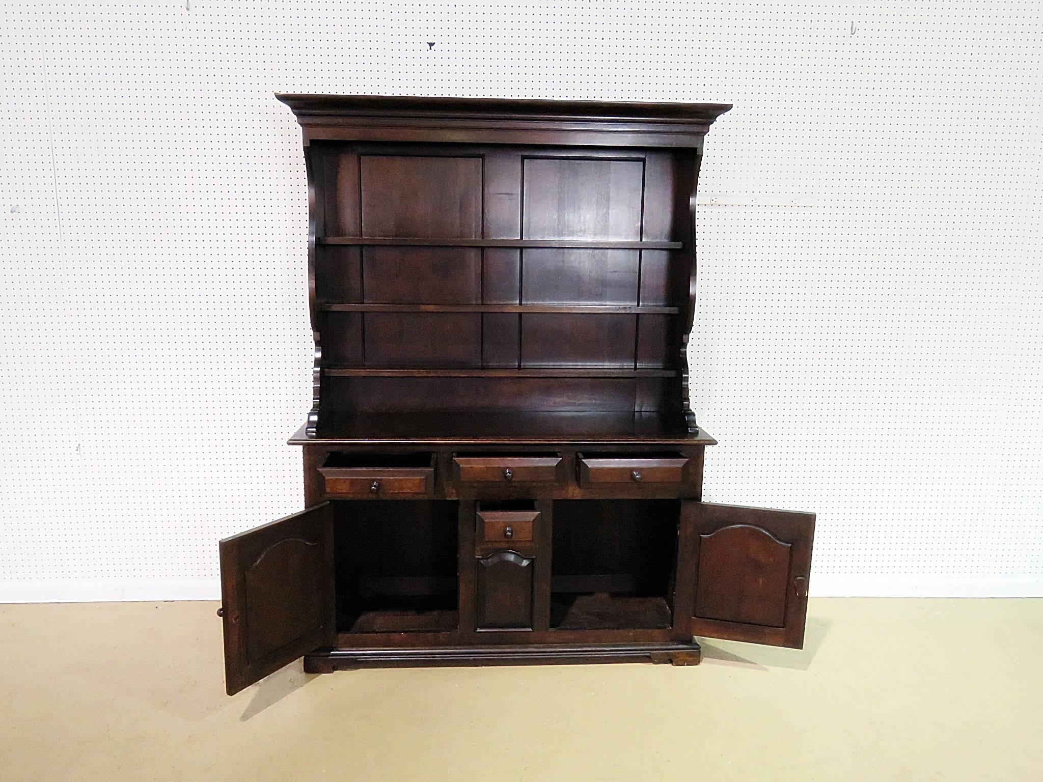 Wallace Nutting two-piece hutch with three shelves, four drawers and two drawers.