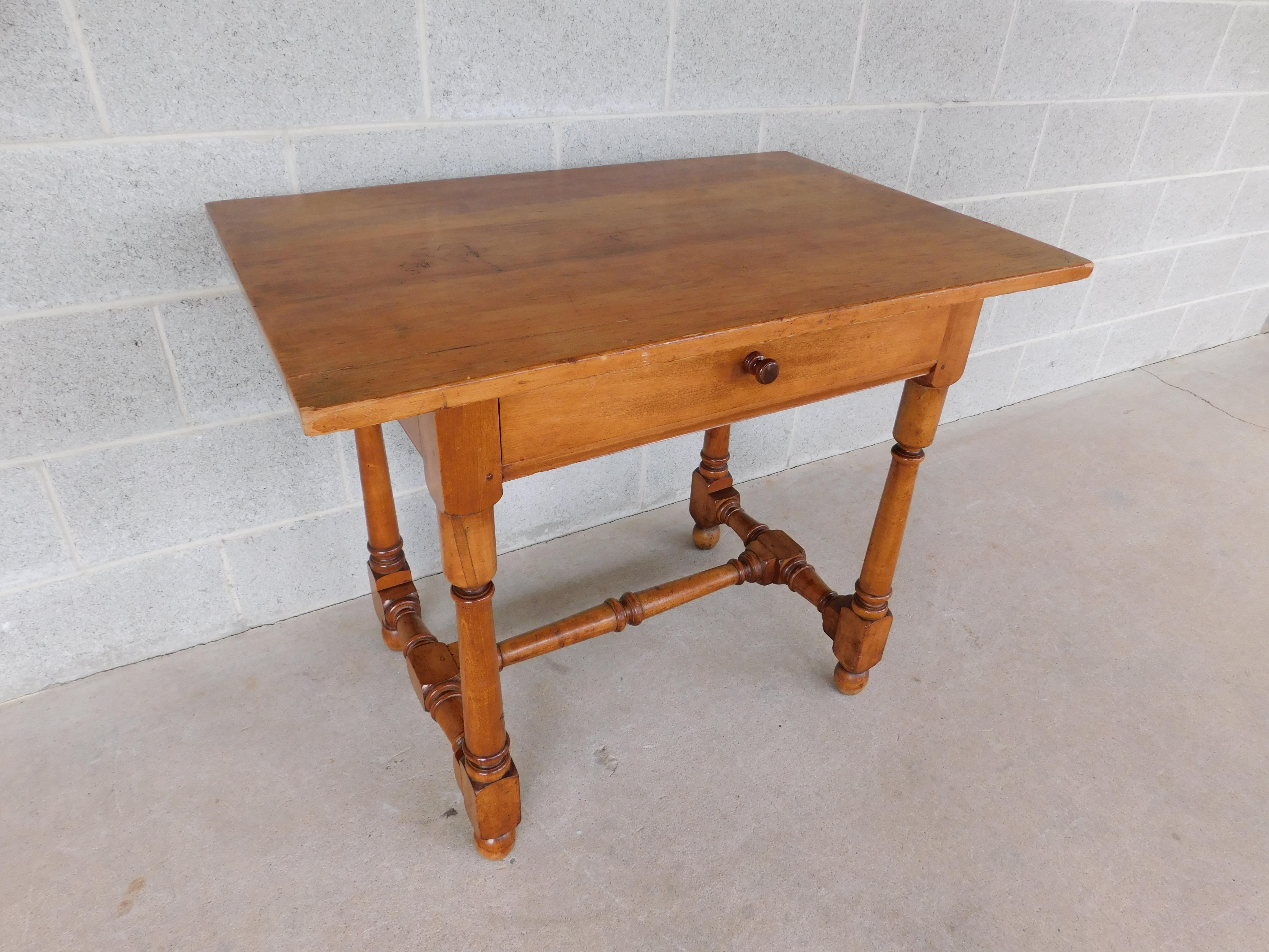 Wallace Nutting Tavern Table #660

Circa 1920's Hardwood Construction, Single Dovetailed Drawer, Joined Stretcher Base.

Writing Desk or Work / Tavern Table

Original Finish and Good Sturdy Condition

36