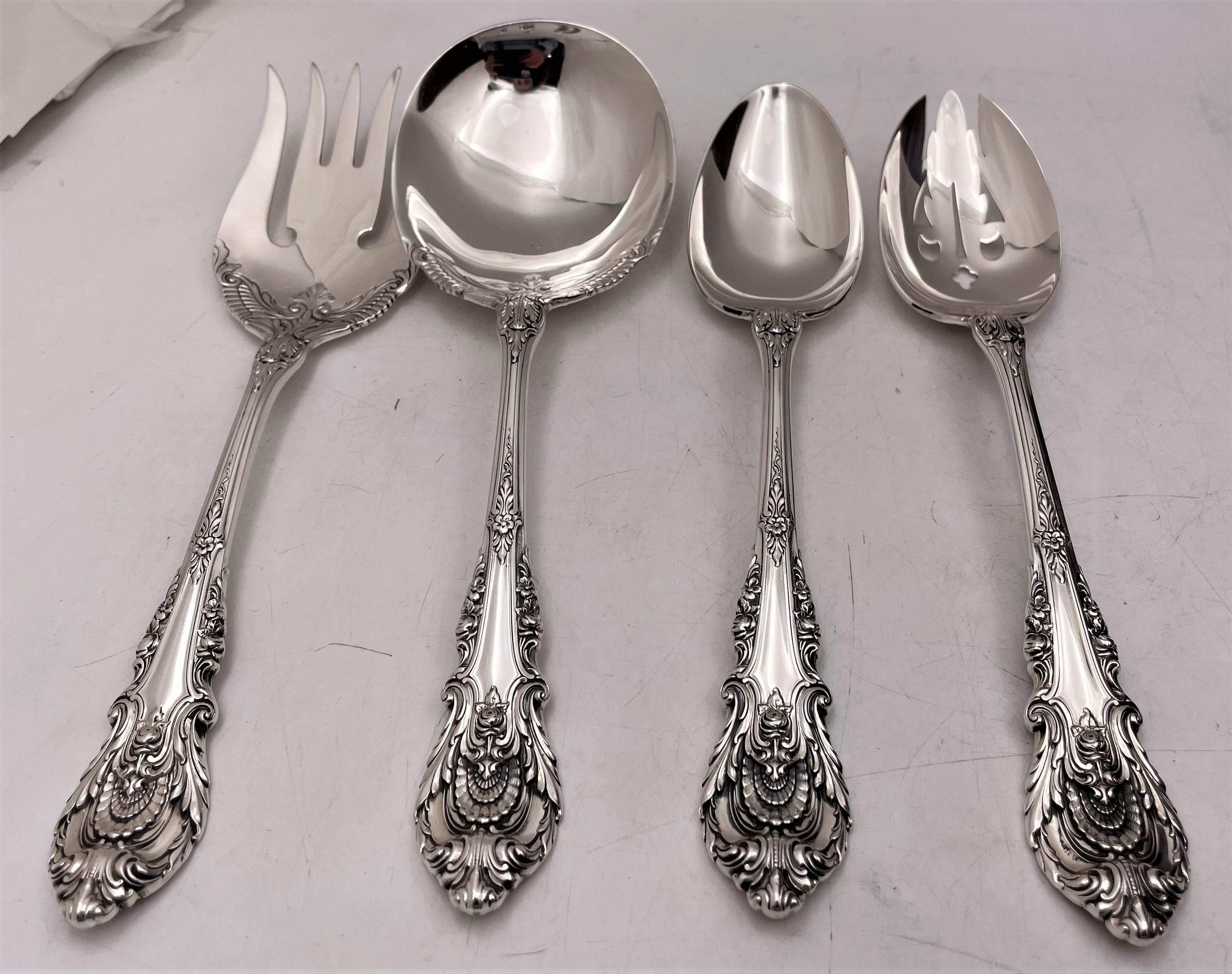 Wallace, sterling silver 88-piece flatware in Sir Christopher pattern, in the English Renaissance style interpreted from the designs of architect Sir Christopher Wren, showing grapes, roses and scroll motifs, consisting of:

- 12 dinner forks