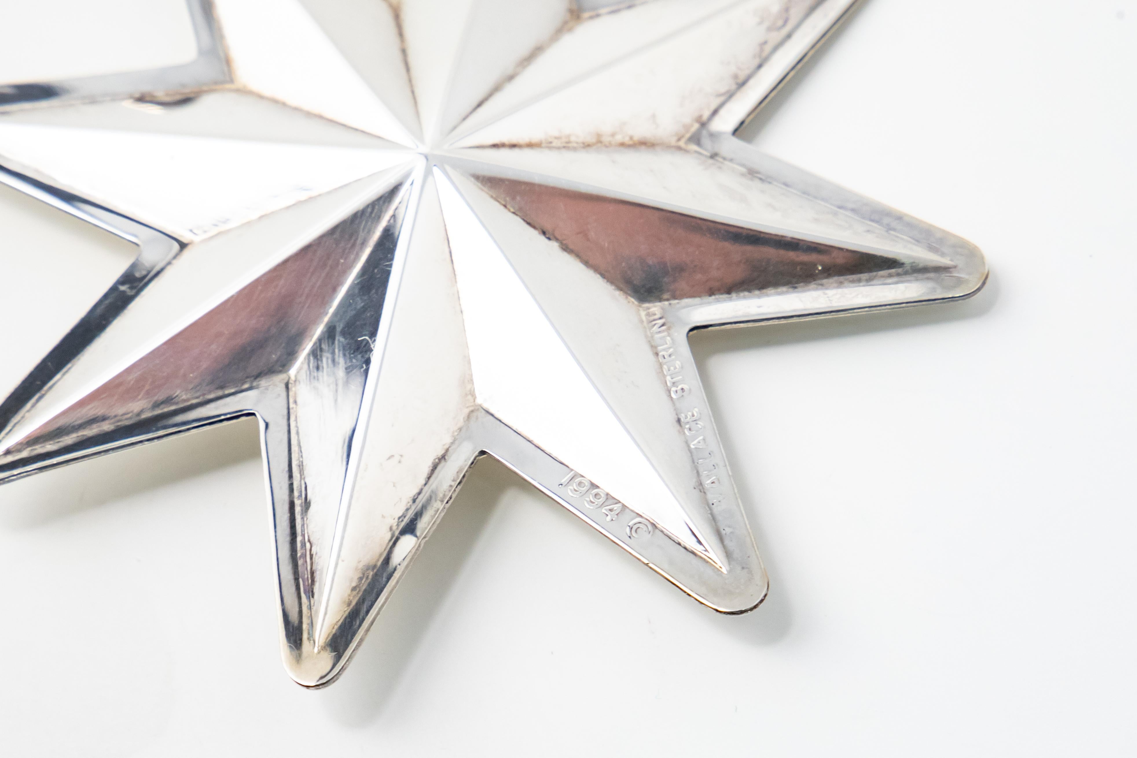 Offering this beautiful Wallace Sterling Christmas star from 1994. Gorgeous patina and simple clean lines make this ornament a stand out. Inscribed on the back with Wallace Sterling, 1994.