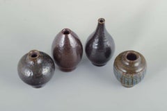 Wallåkra Ceramics, Sweden. Four small ceramic vases. Mid-20th c.