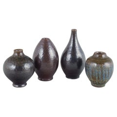 Wallåkra Ceramics, Sweden. Four small ceramic vases. Mid-20th c.