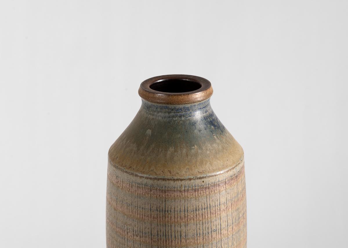 A sizeable mid-century stoneware vase. 

Impressed: WALLAKRA.