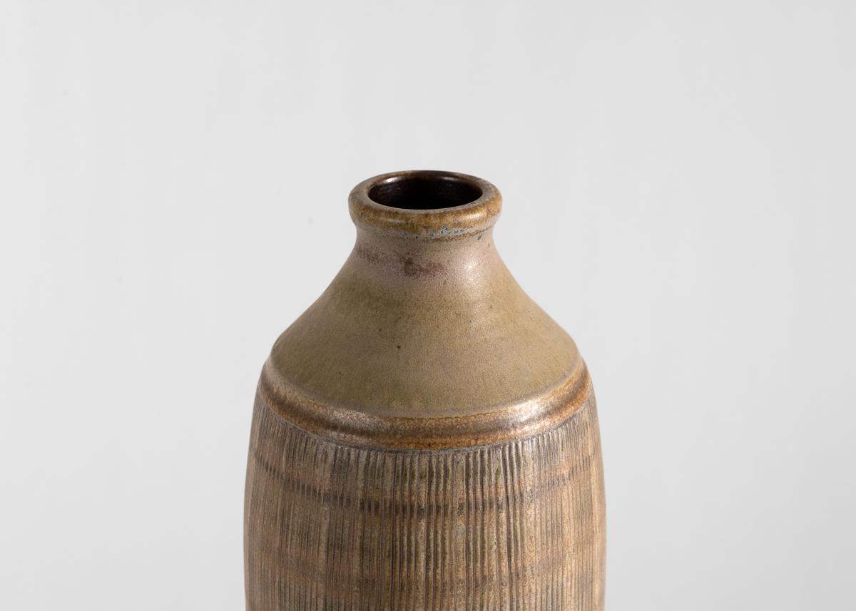 A sizeable mid-century stoneware vase. 

Impressed: WALLAKRA.