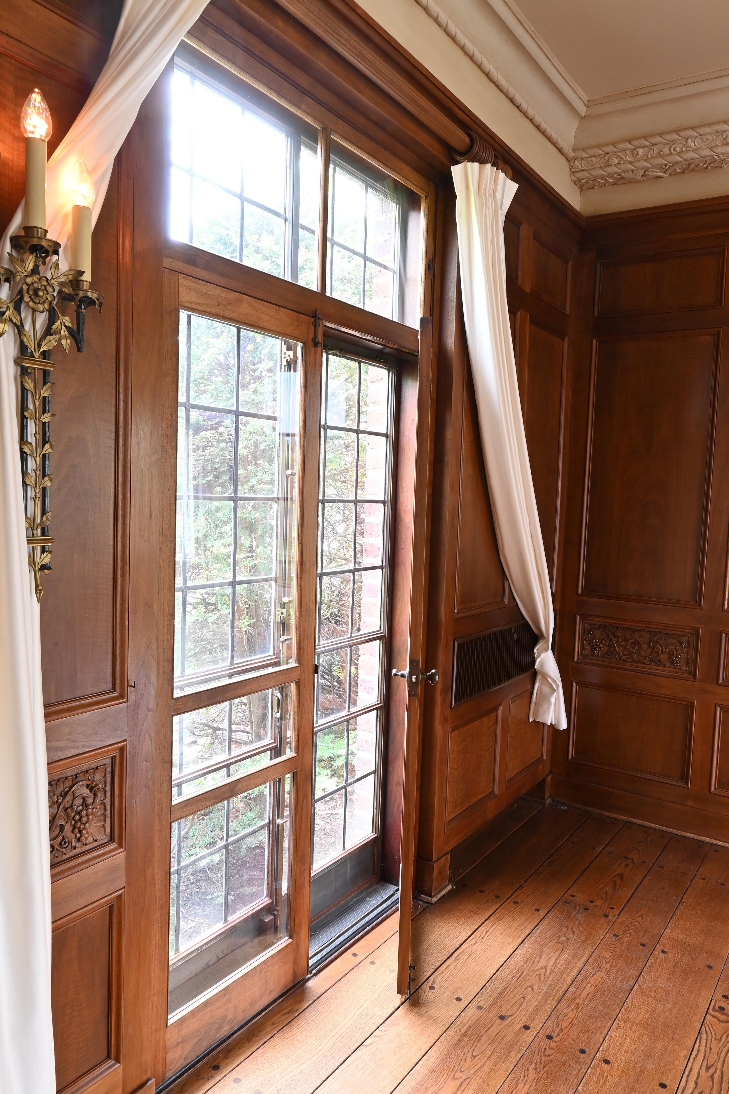 Walnut 1929 Paneled Complete Great Room Carved with Mantle & 4 French Doors For Sale 2