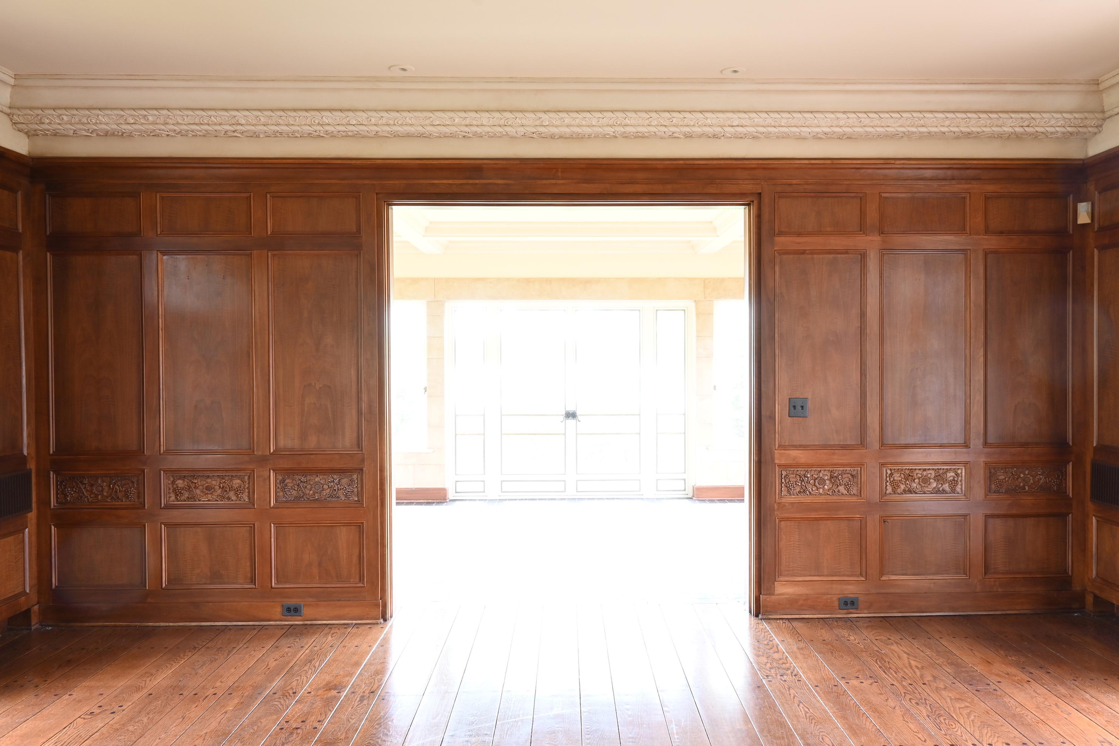 American Walnut 1929 Paneled Complete Great Room Carved with Mantle & 4 French Doors For Sale