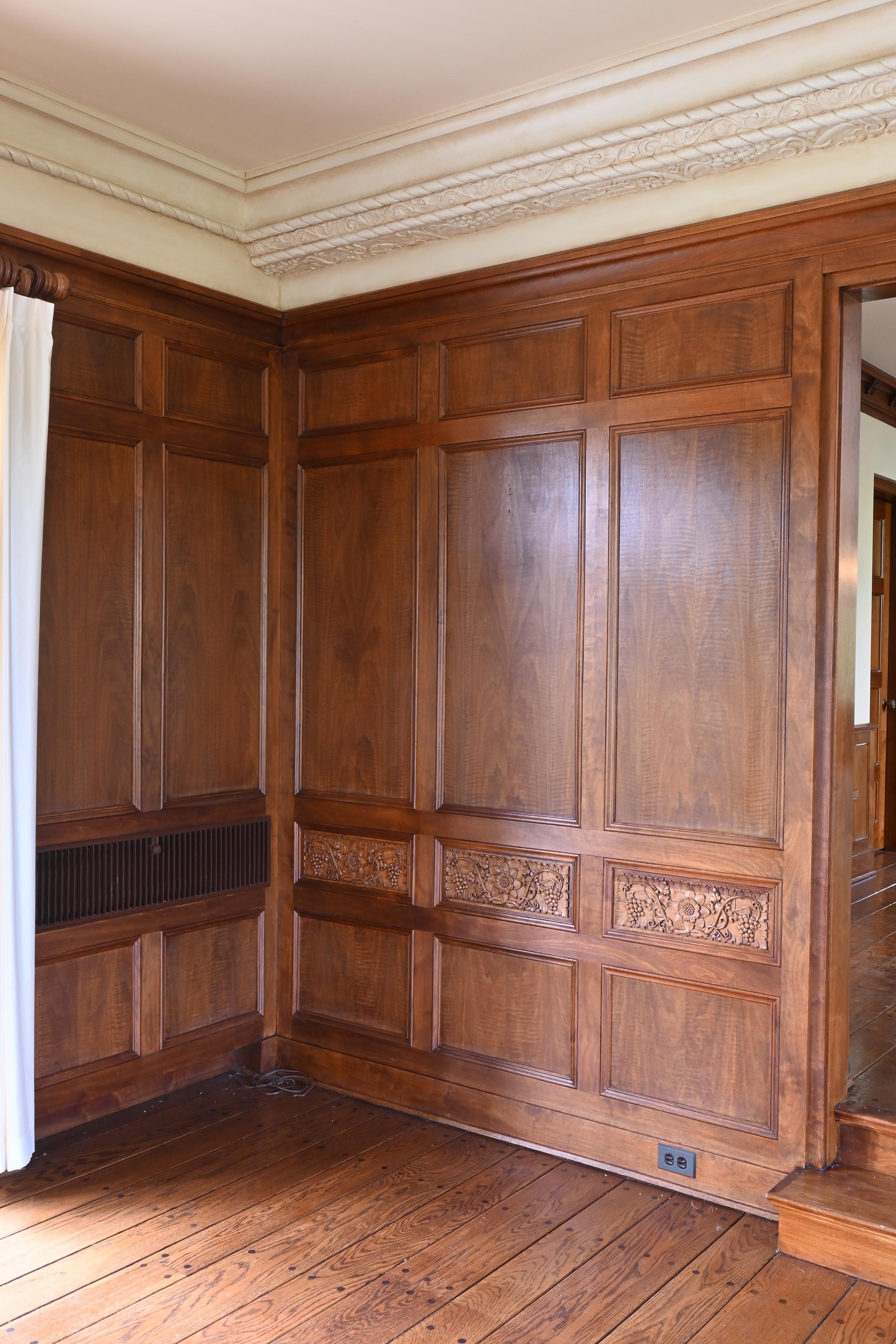 Early 20th Century Walnut 1929 Paneled Complete Great Room Carved with Mantle & 4 French Doors For Sale