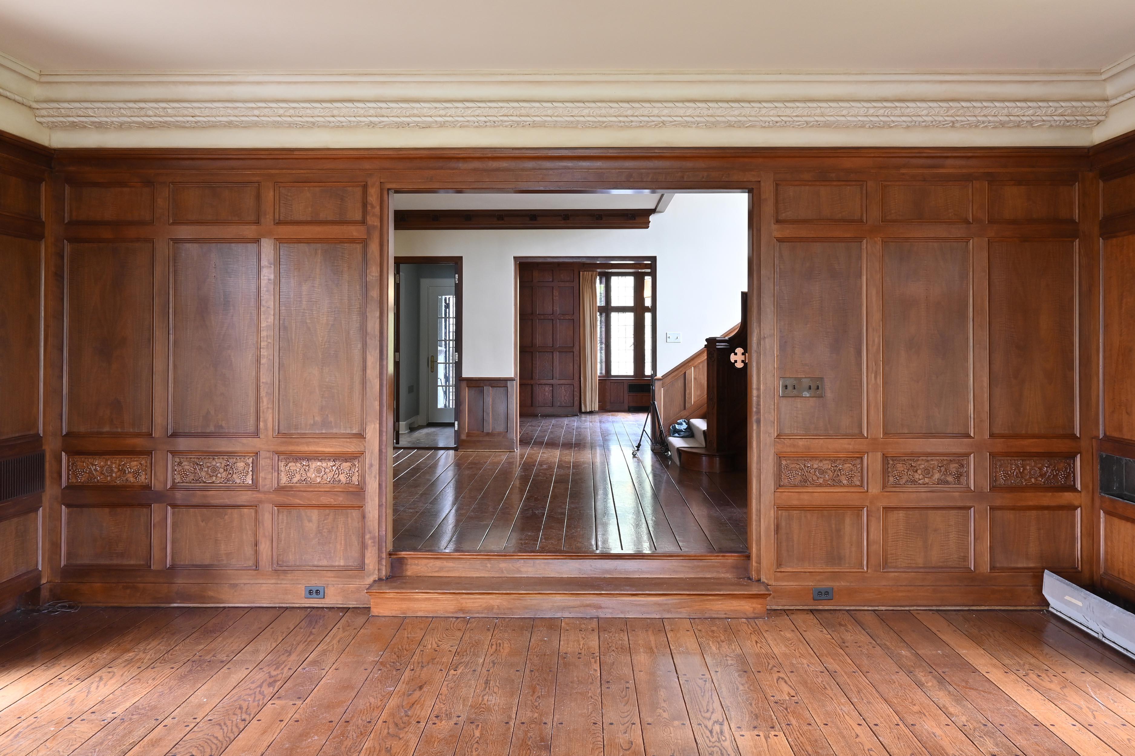 Glass Walnut 1929 Paneled Complete Great Room Carved with Mantle & 4 French Doors For Sale
