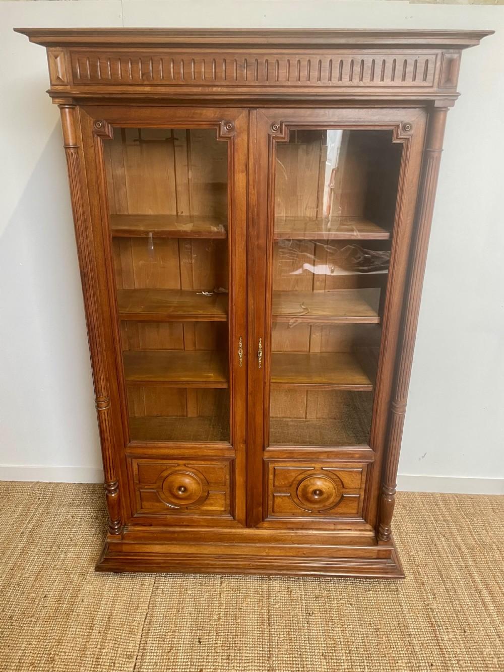 Very good quality late 19th century solid walnut 2 door bookcase
French circa 1880's with 4 fully adjustable shelves ( we have made new plywood shelves lipped with walnut ) the beauty of this piece is that it can flat pack for ease of transportation
