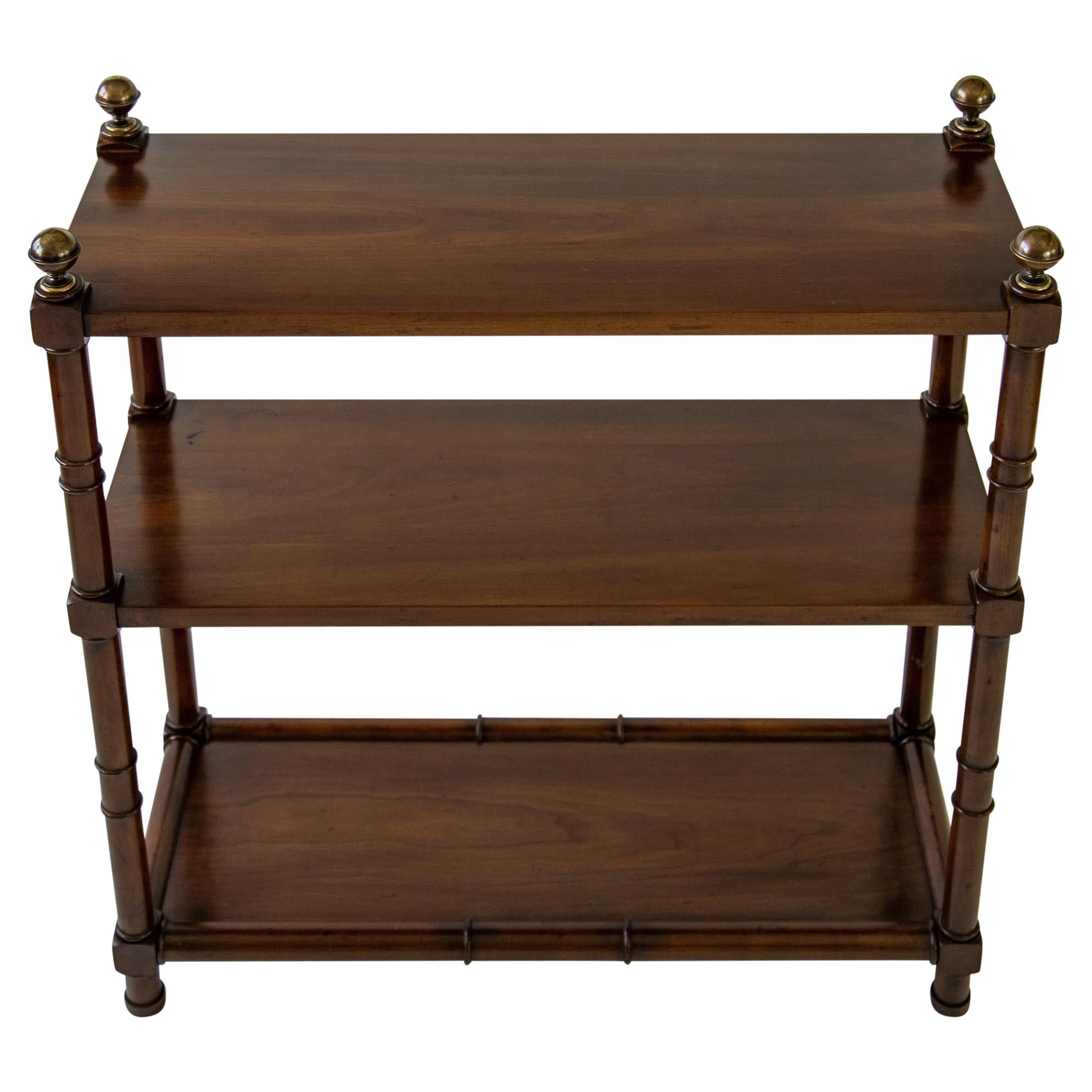 Vintage walnut open three-shelf bookcase or display étagère with bamboo-style detail and brass ball finials. Measures: Bottom shelf 4