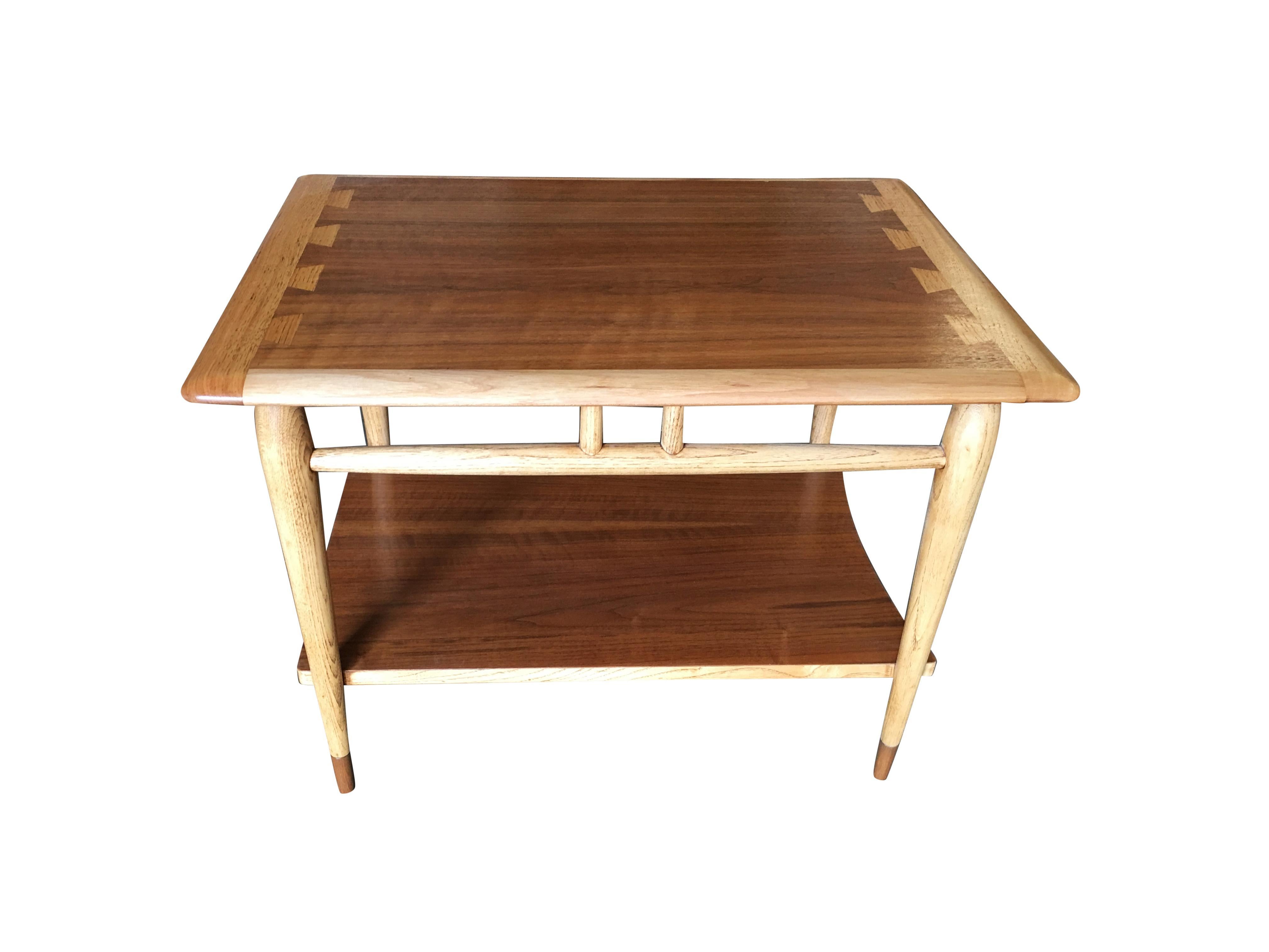 Mid-Century walnut two-tier side table with walnut and ash inlay designed by Andre Bus for Lane in 1958.
