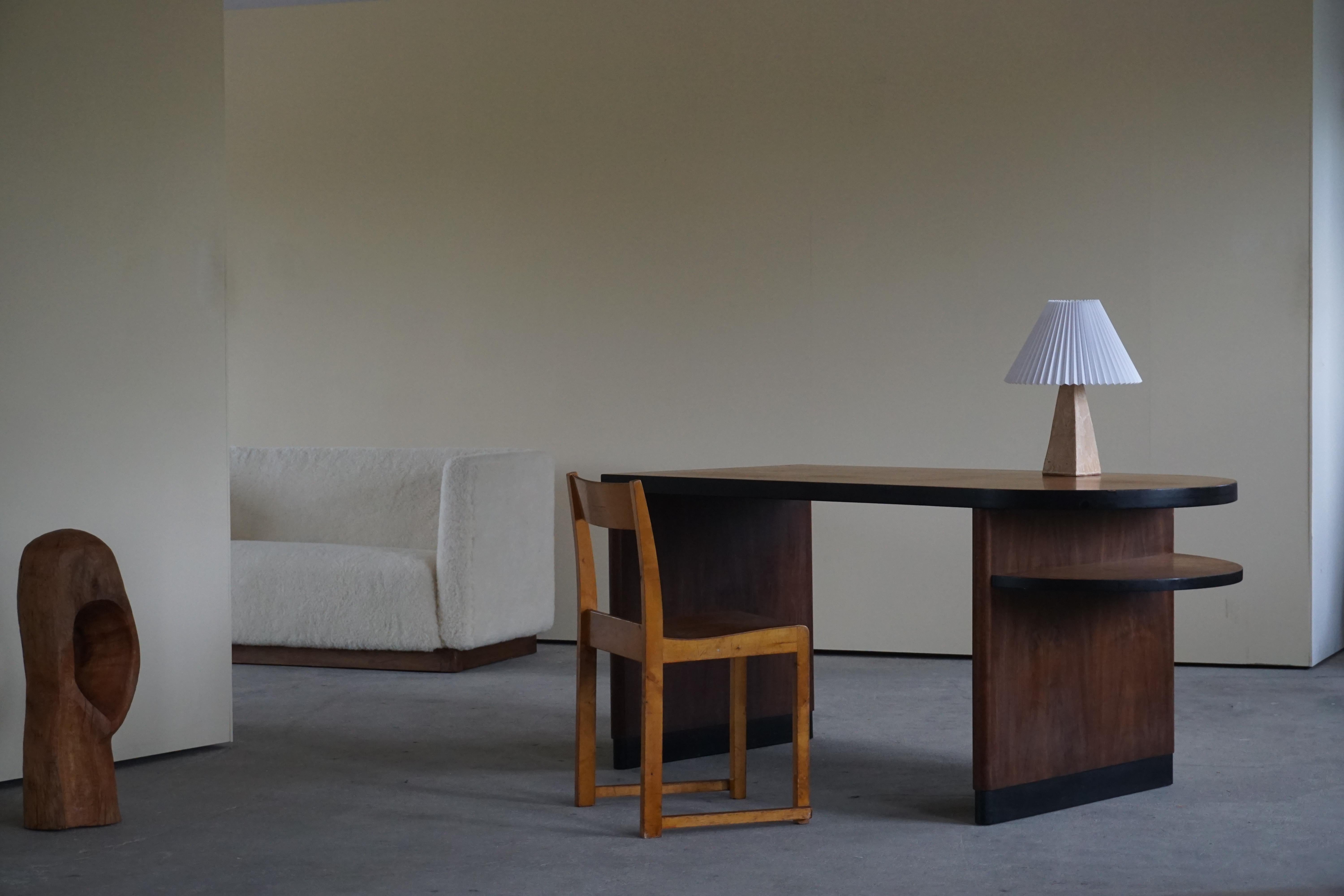 Elegant rare freestanding desk in walnut and birch, designed by Axel Einar Hjorth for Nordiska Kompaniet, 1930s. 

This fine vintage desik will complementary many interior styles. A modern, Scandinavian or an art deco home decor. The overall