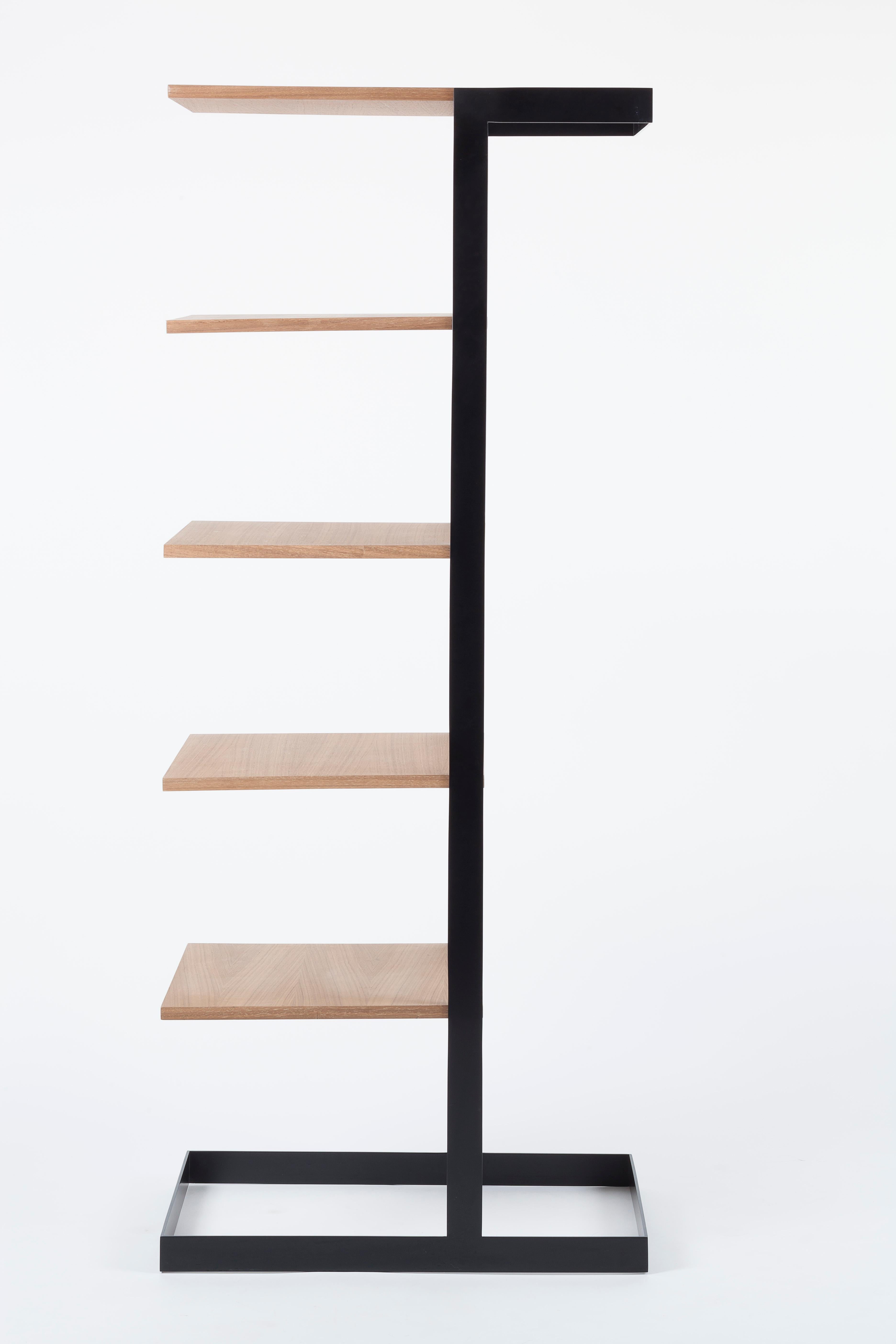 The Severin Shelf combines 5 shelves on one side with a clothes hanging area on the other. It can be placed in an entranceway to store coats, hats & scarves, or in a bedroom for quick acces to one’s most frequently used clothes. The richness of its