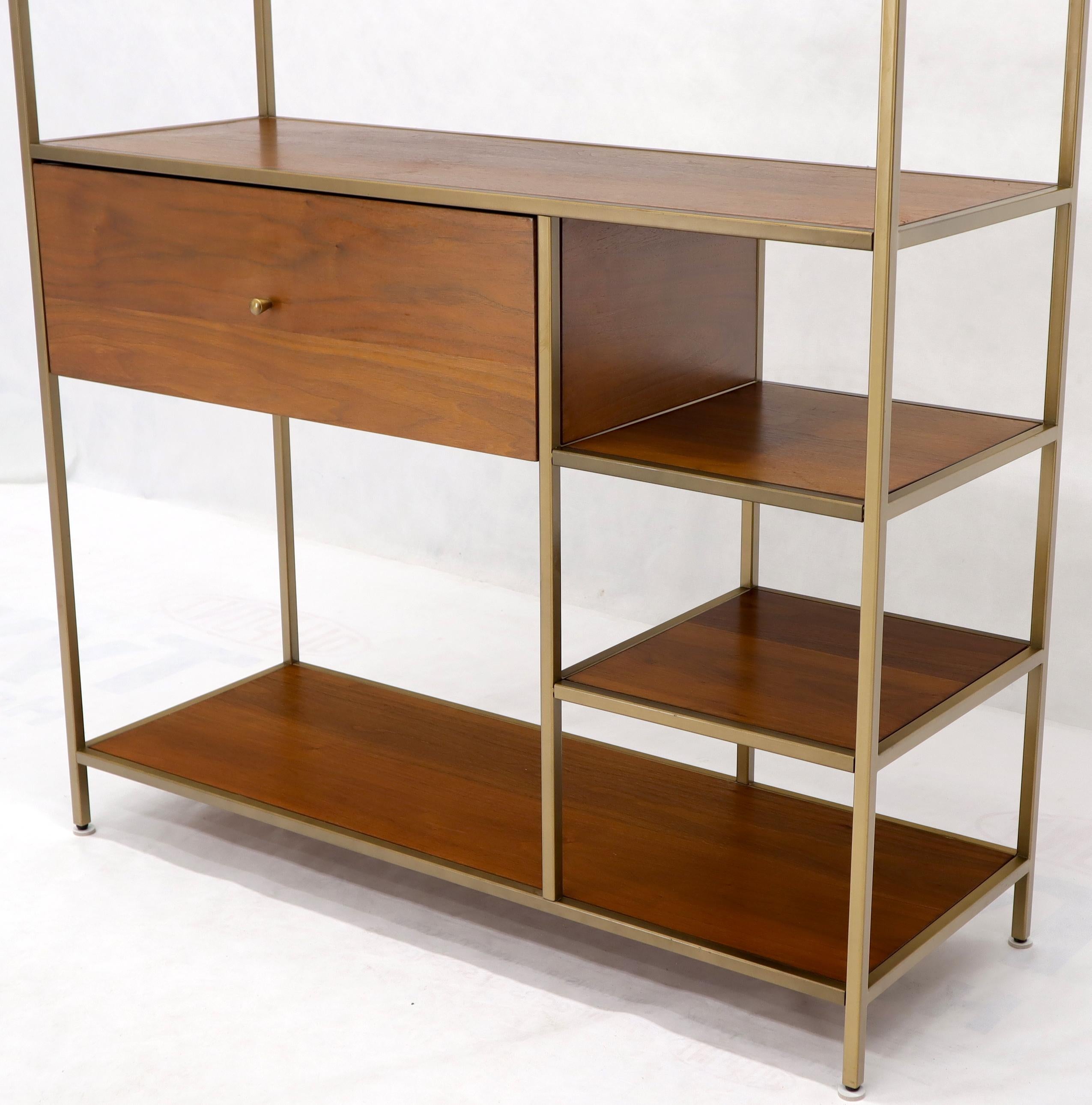 brass shelving unit wall