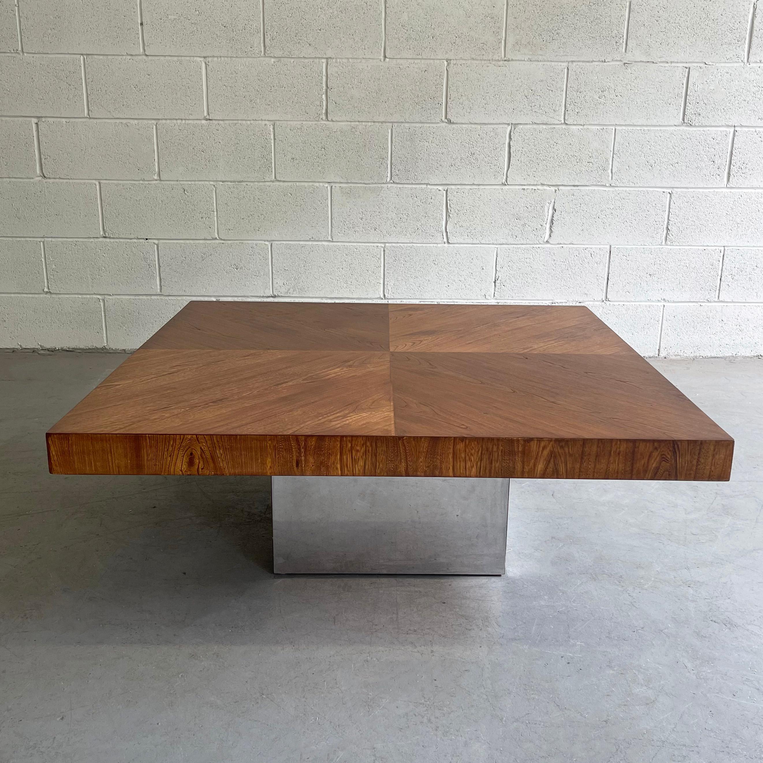Mid-Century Modern, square coffee table by Milo Baughman for Thayer Coggin featues a contrasting grain, walnut top with chrome cube base.