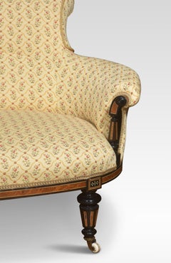 Walnut and ebony framed two seater settee