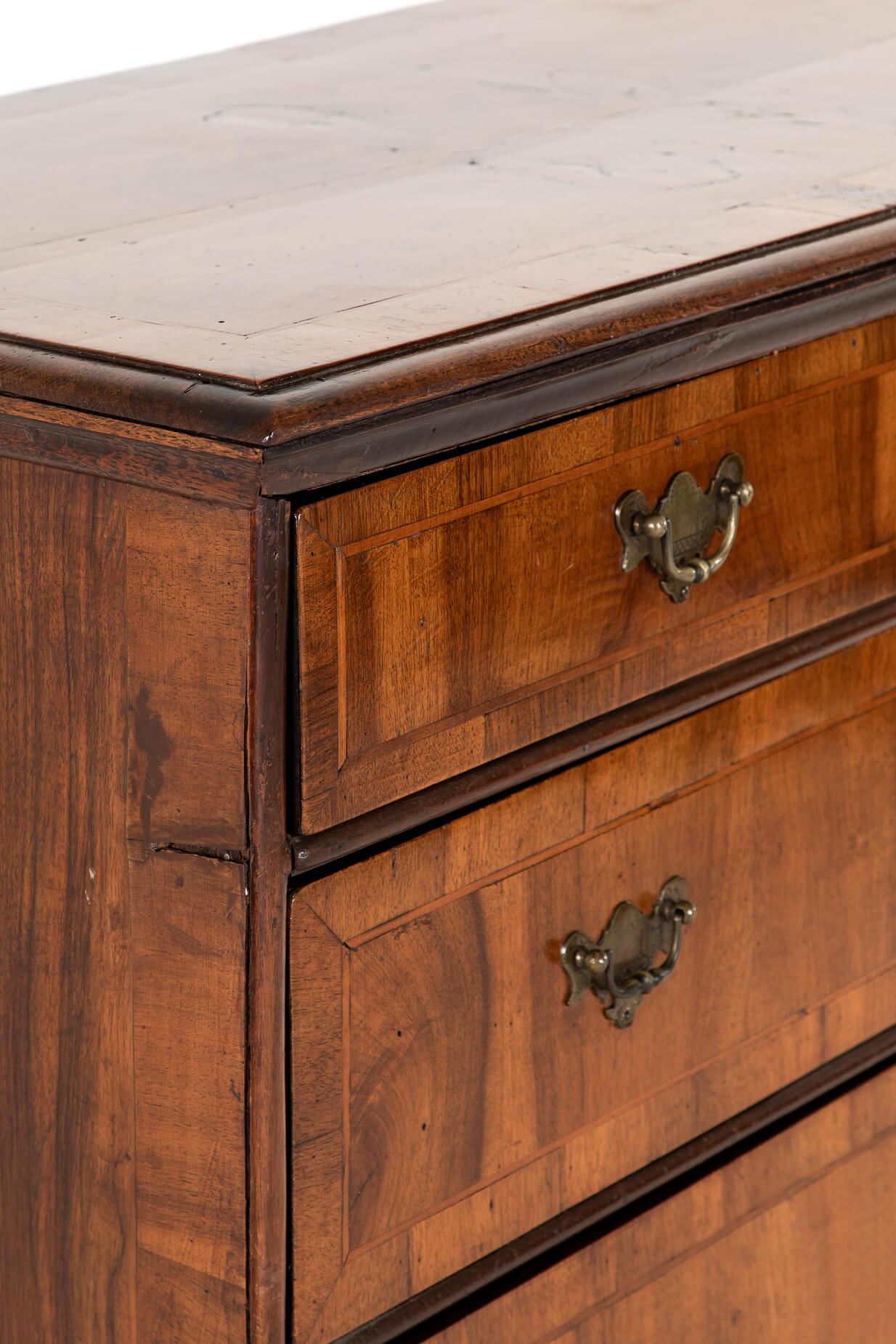 Hand-Crafted Walnut and Feather Banded Chest of Drawers For Sale
