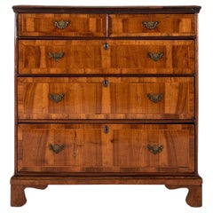 Walnut and Feather Banded Chest of Drawers