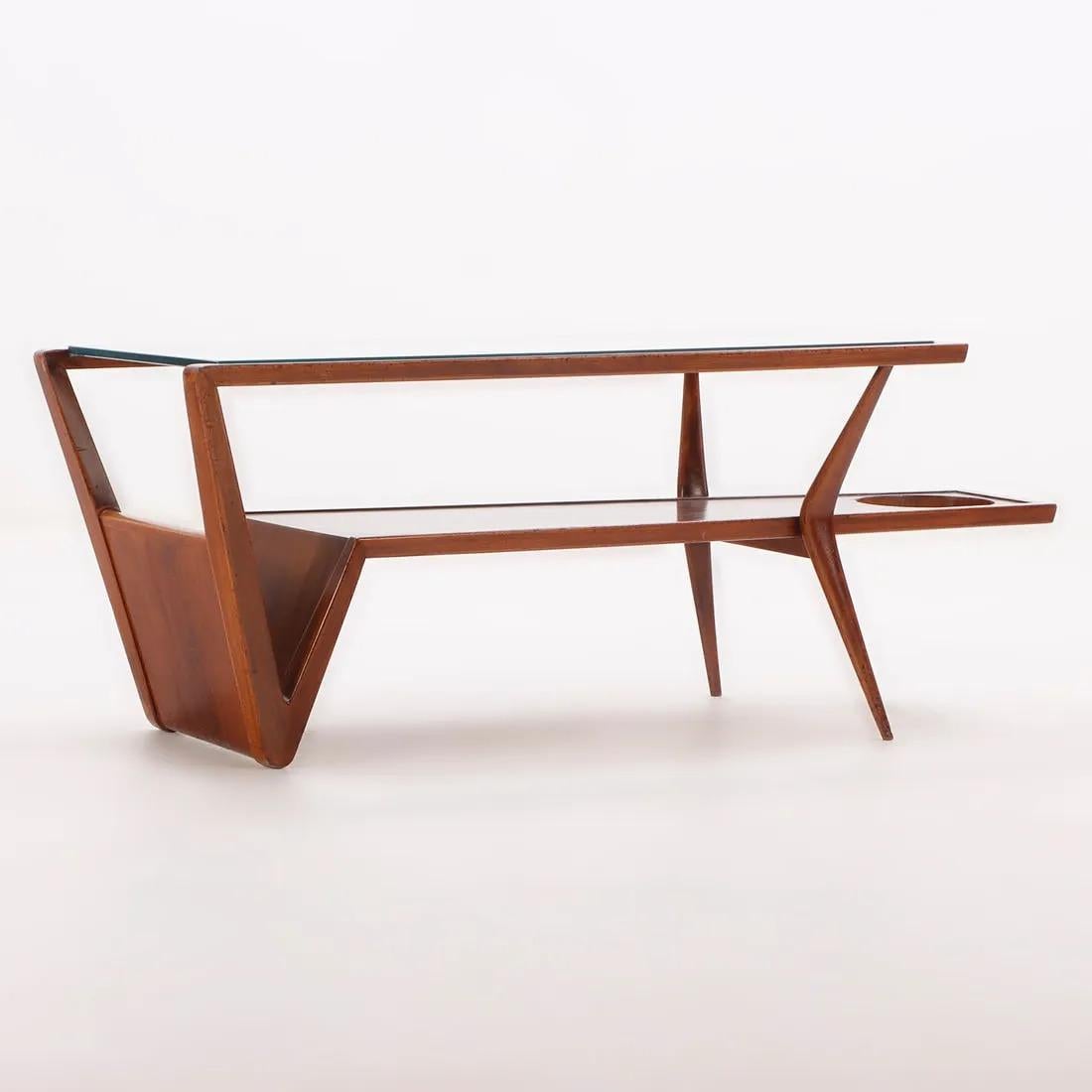 Mid Century Modern walnut and glass coffee table with an angular design and magazine holder.  The round hole in the coffee table is for an ice bucket (not included).