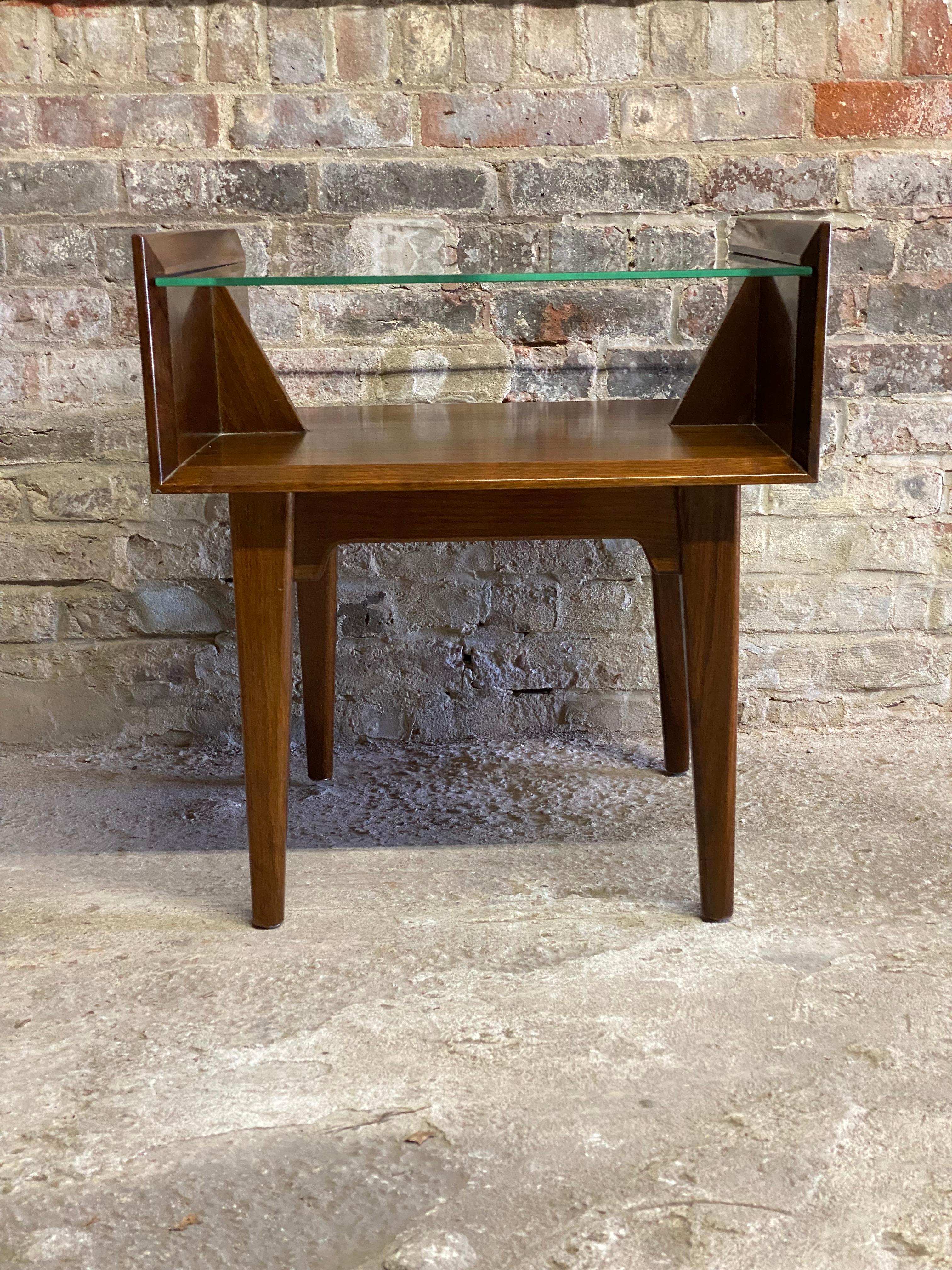 Walnut and glass end table. Reminiscent of some famous designers like Jens Risom or early Milo Baughman for Glenn of California or James Inc. Circa 1955-65. Nice angular proportions softened by the curved corners of the table's apron. Removable