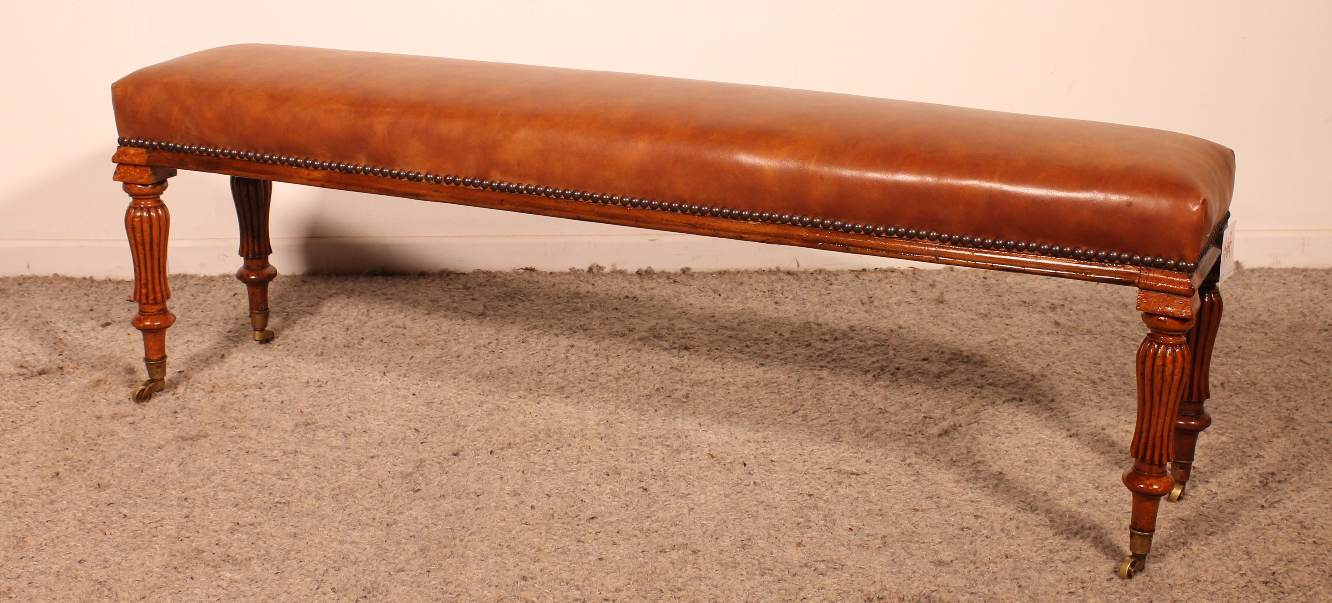 British walnut and leather bench from the 19 century For Sale
