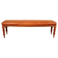 Antique walnut and leather bench from the 19 century