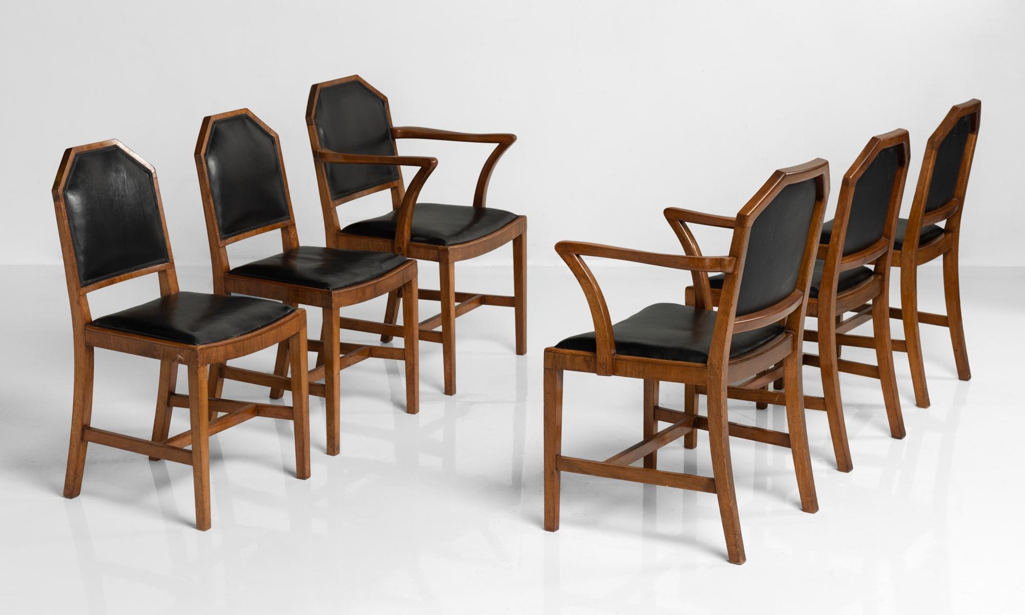 Walnut and leather dining chairs by Heals of London, England, circa 1915

Beautiful set of (6) dining chairs constructed in walnut, with original leather upholstery.

Measures: 21.5” W x 21.5” D x 34.5” H x 17.5” seat, arm Height 28”.
