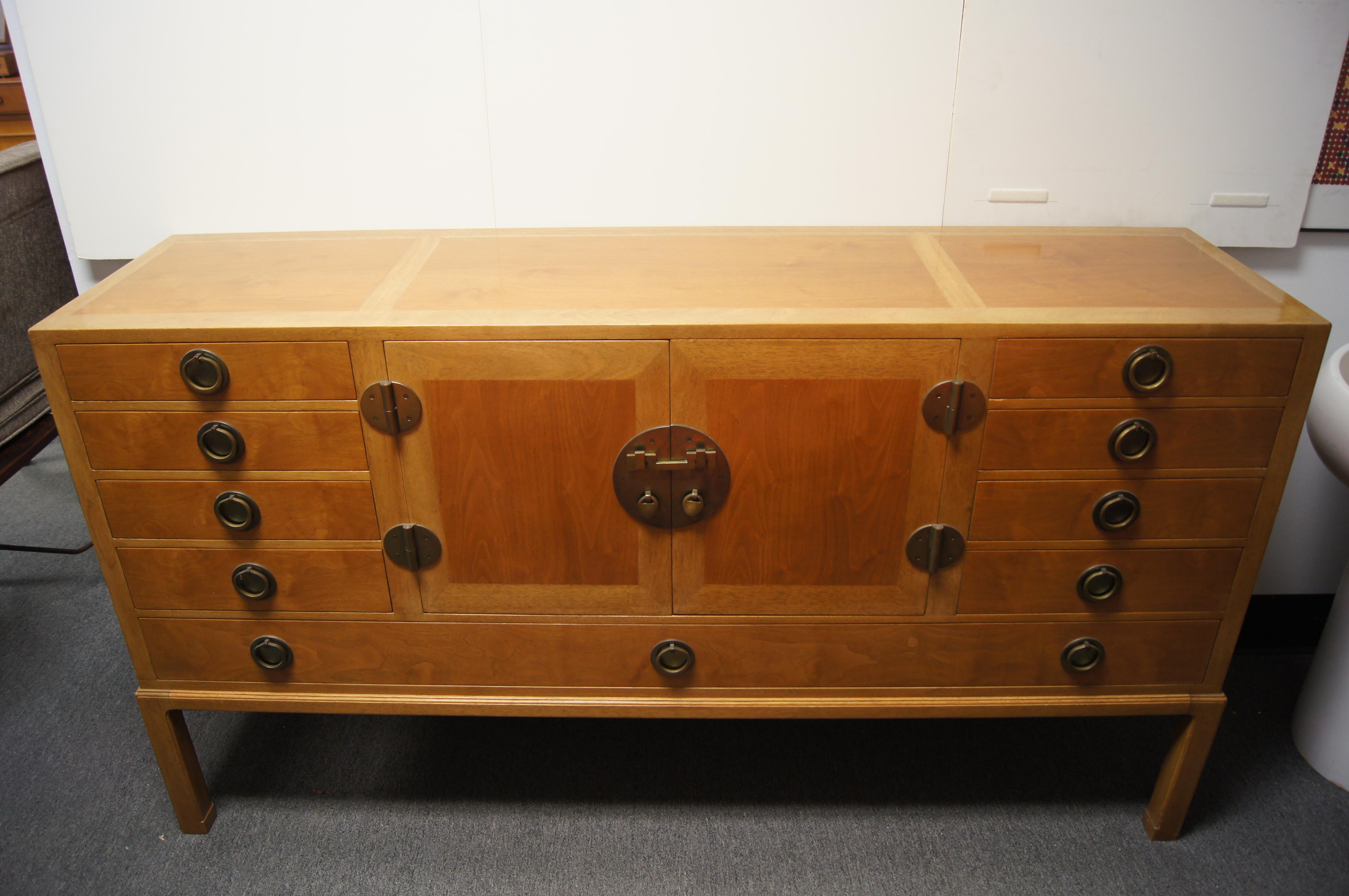 Designed by Edward Wormley for Dunbar in 1945, this exquisite sideboard, model 4579, appeared in the 1997 exhibition 