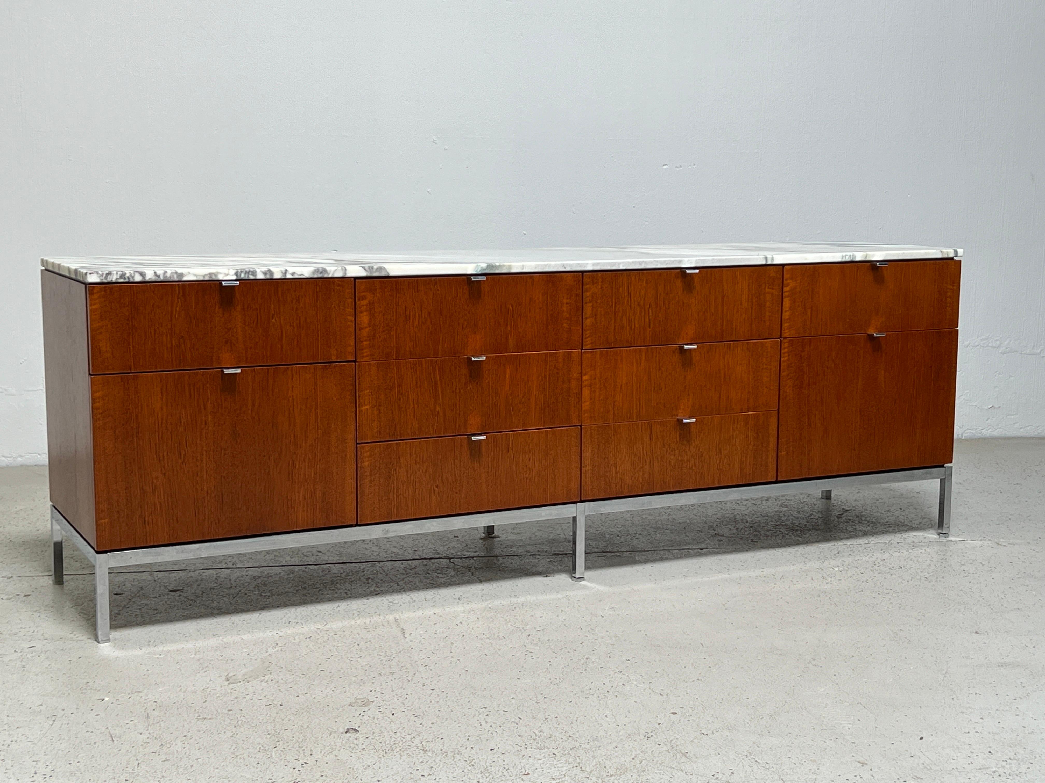 A Florence Knoll for Knoll walnut credenza with marble top.