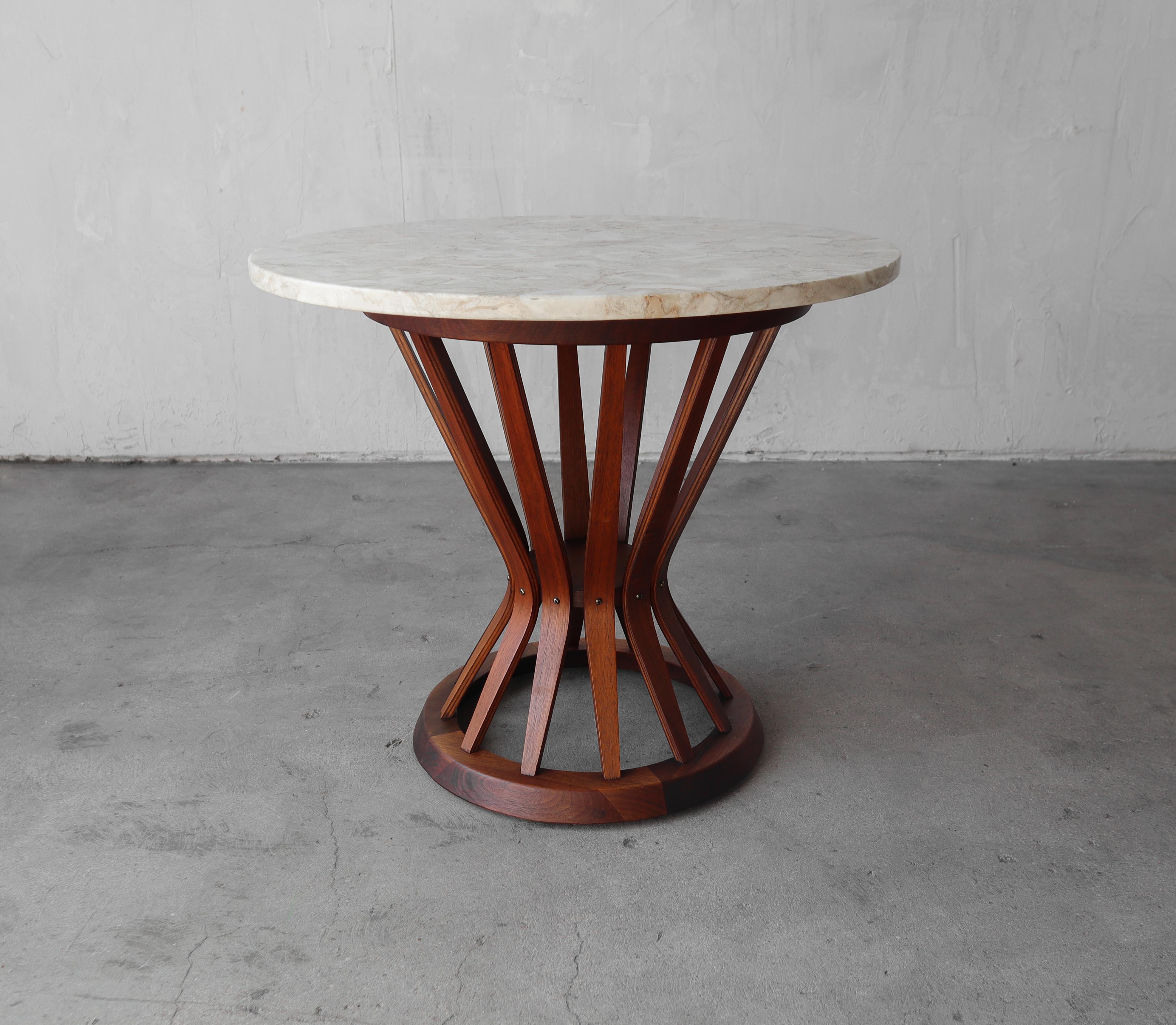 Gorgeous mid-century walnut and marble side table with brass details, designed in the 1950's by Edward Wormley for Dunbar. 

Table is in pristine condition with no imperfections to be noted. Installation ready.

Glass top can be included or