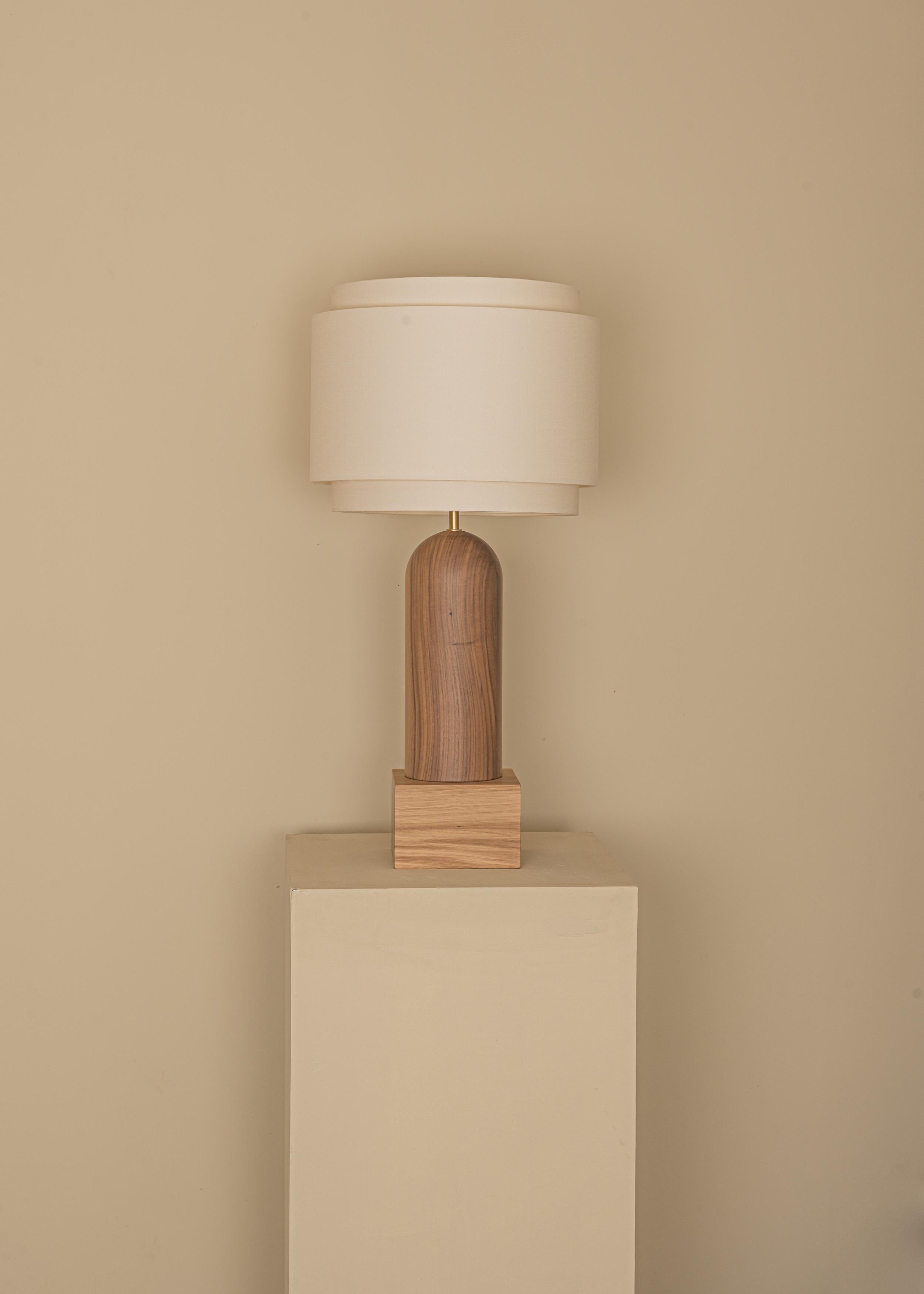Walnut And Oak Base Pura Kelo Double Table Lamp by Simone & Marcel
Dimensions: D 35 x W 35 x H 69 cm.
Materials: Brass, cotton, oak and walnut.

Also available in different marble, wood and alabaster options and finishes. Custom options available on