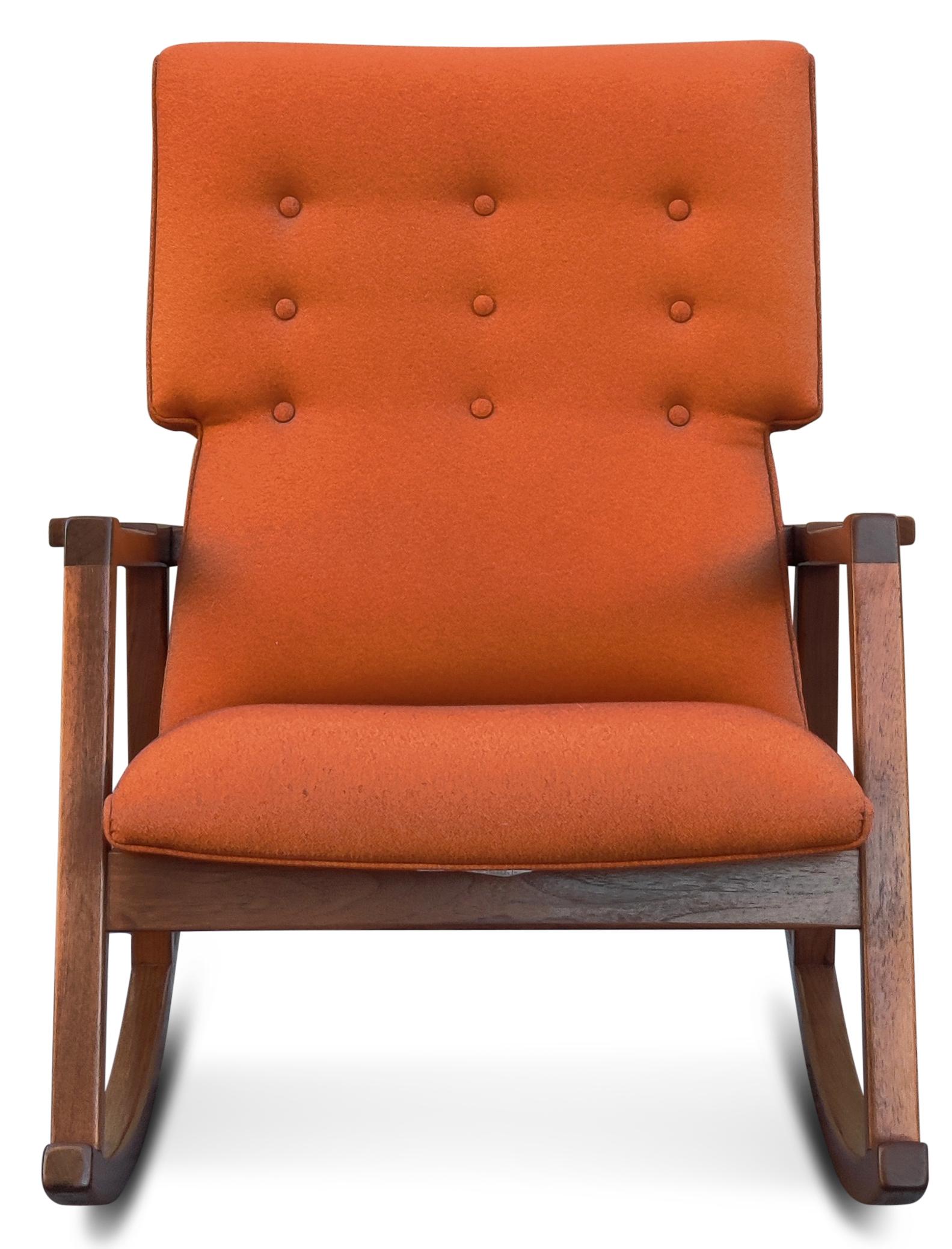 Coming from prestigious manufacturer Design within reach, based in Connecticut, this Jens Risom designed walnut and orange wool rocking chair makes a statement. The vibrant orange contrasts very well with the deep and rich brown of the walnut frame,
