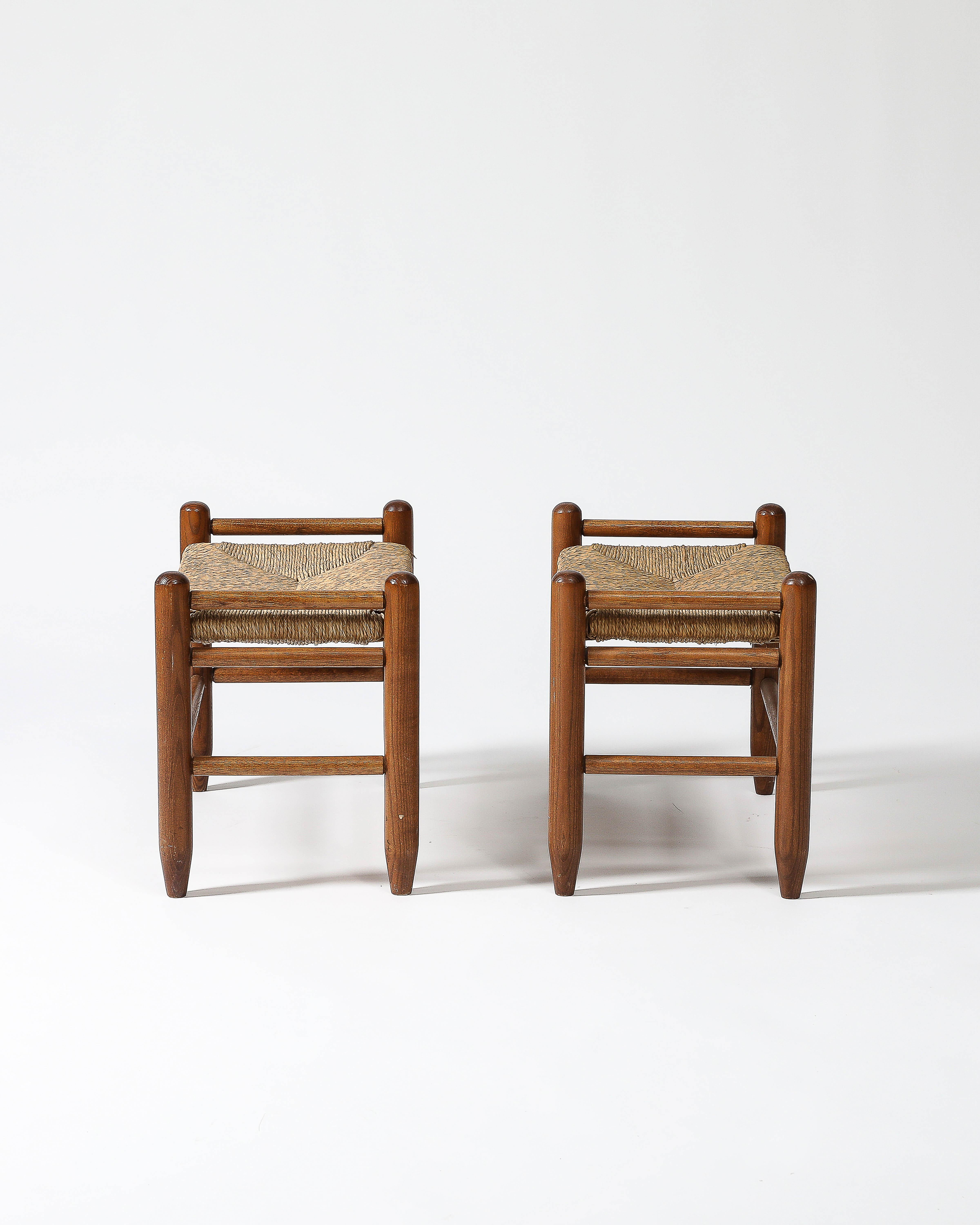 Charming, low stools with handmade frames and woven seats. 
